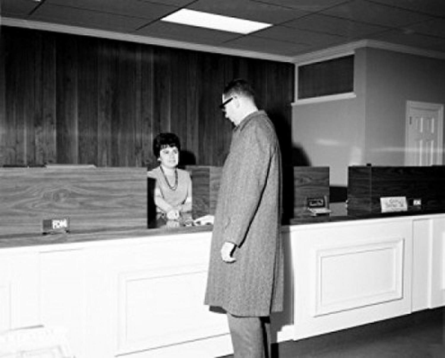 Man at Hotel Reception Desk Poster Print - 18x24 Inches - Vintage Travel Art for Office, Home & Hotel Decor