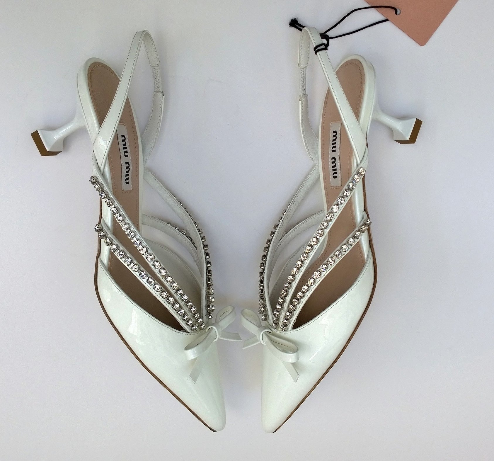 Miu Miu Women's White Patent Leather Slingback Heels with Rhinestone Accents & Bow Detail - Elegant Dress Shoes for Weddings, Parties & Special Occasions