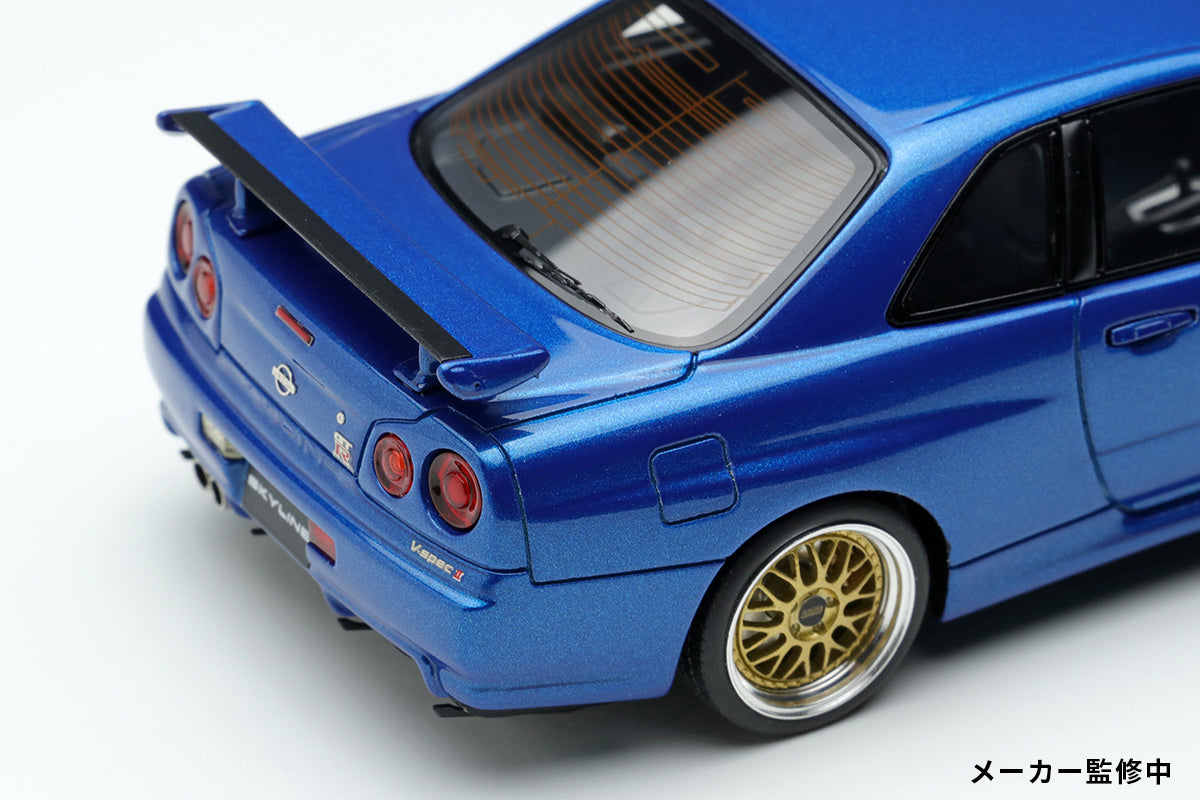PREORDER Make Up Co., Ltd Eidolon 1:43 Scale Nissan Skyline GT-R (BNR34) V Spec II 2000 Model Car with BBS LM Wheels in Bayside Blue - Perfect for Collectors, Display, and Diecast Enthusiasts