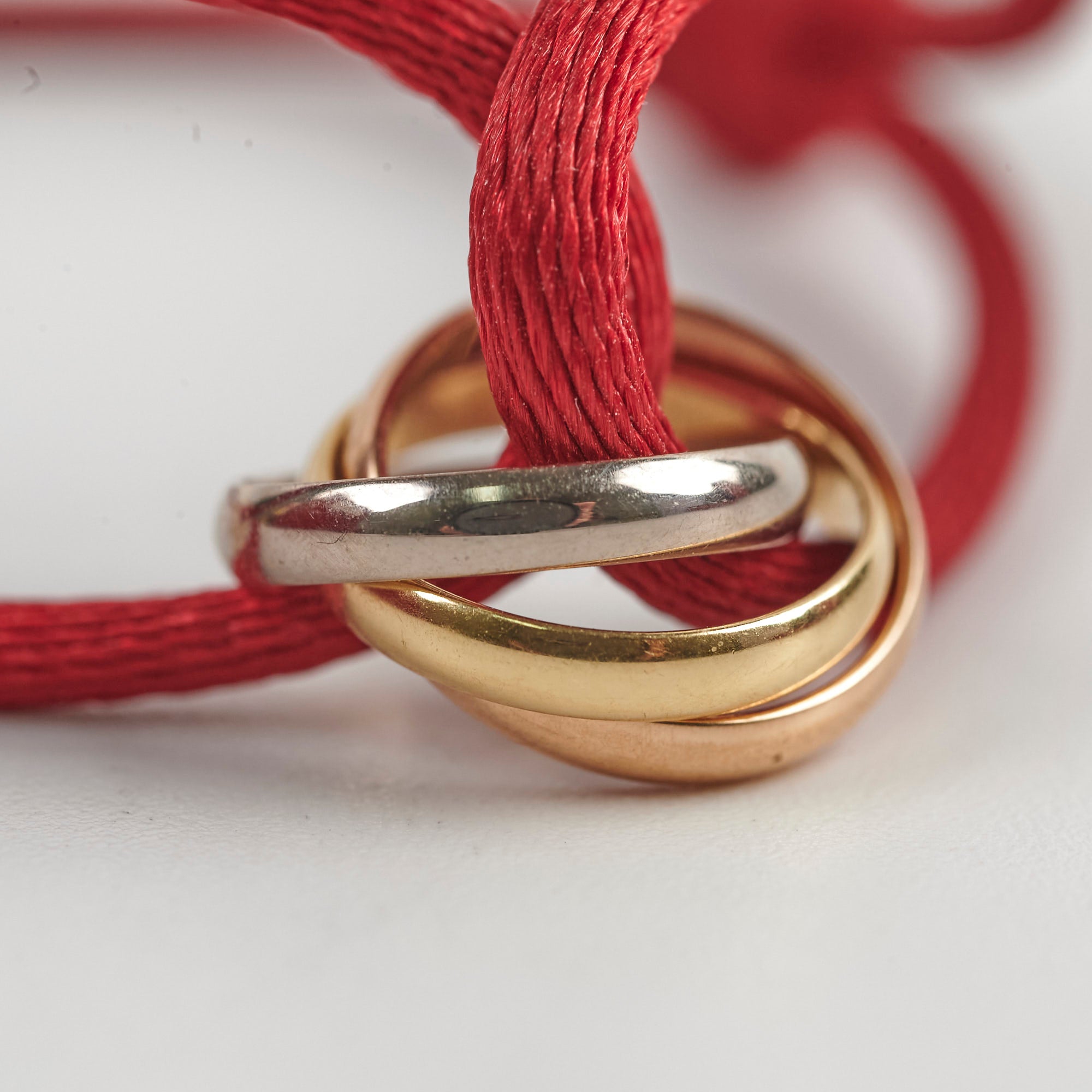 Cartier Trinity Bracelet in Red - 18K Gold Tri-Color Interlocking Rings - Luxury Jewelry Gift for Women - Perfect for Anniversaries, Valentine's Day & Special Occasions