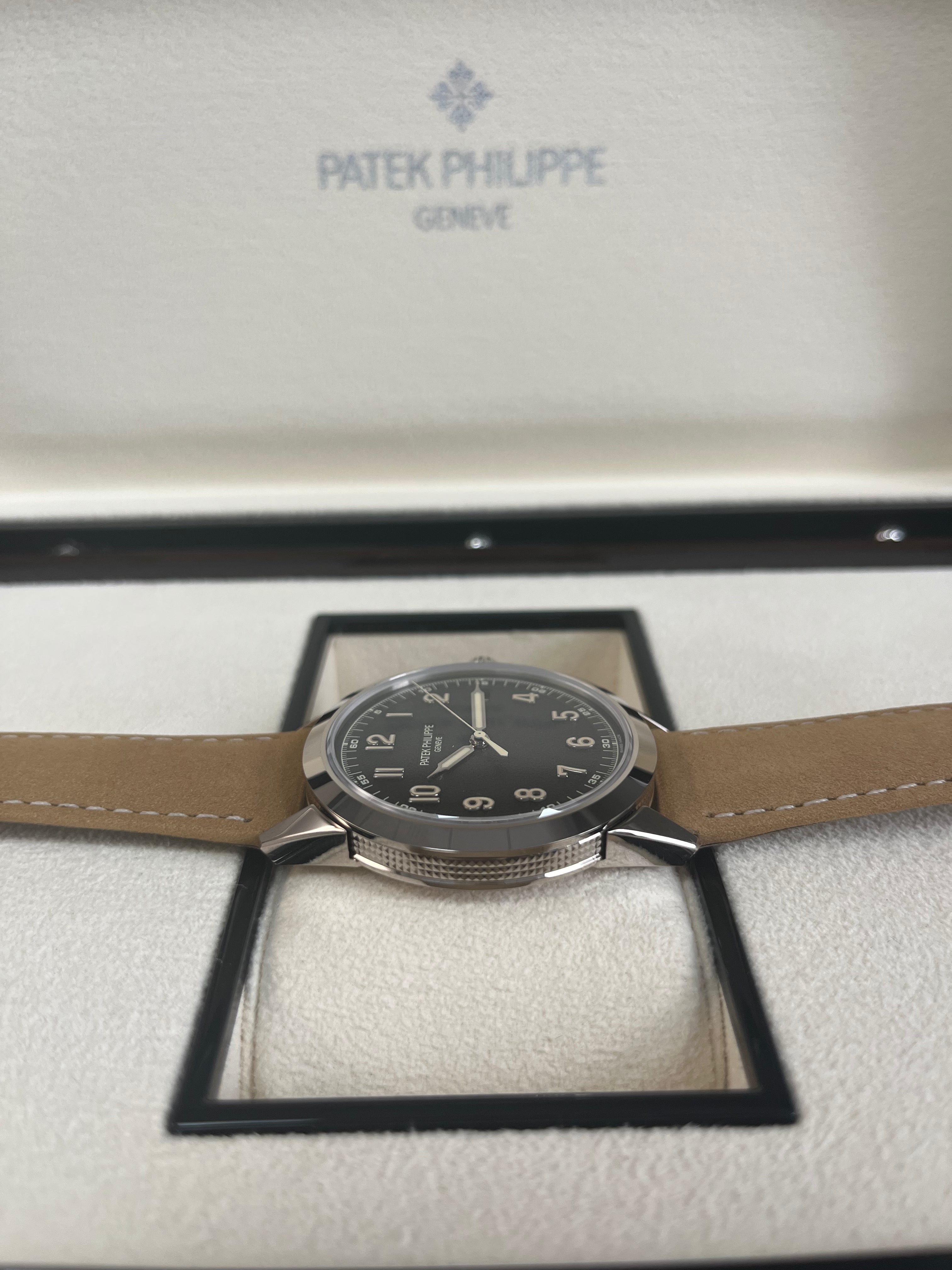 Patek Philippe Calatrava 5226G-001 40mm Men's Luxury Watch - 18K White Gold Case with Textured Dial - Perfect for Business Meetings & Formal Occasions