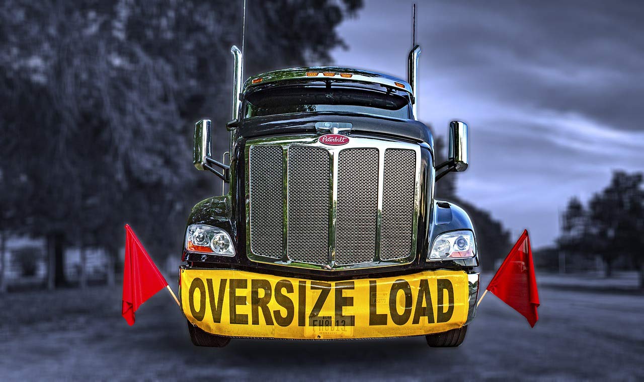 Oversize Load Sign for Trucks - Heavy Duty Reflective Oversized Load Banner with Bungee Hooks & Red Safety Flags - DOT Compliant Warning Sign for Transporting Large Equipment (Perfect for Semi Trucks, Trailers & Construction Vehicles)