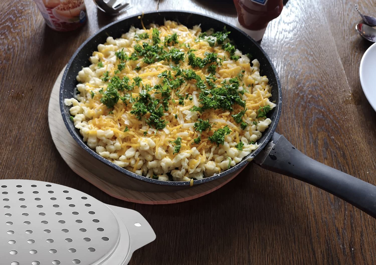 Premium Stainless Steel Spaetzle Maker with Lid & Scraper - German Egg Dumpling Noodle Press - Fits Most Pots & Pans - Perfect for Homemade Spaetzle, Dumplings & Pasta - Great for German Cuisine, Family Dinners & Cooking Enthusiasts