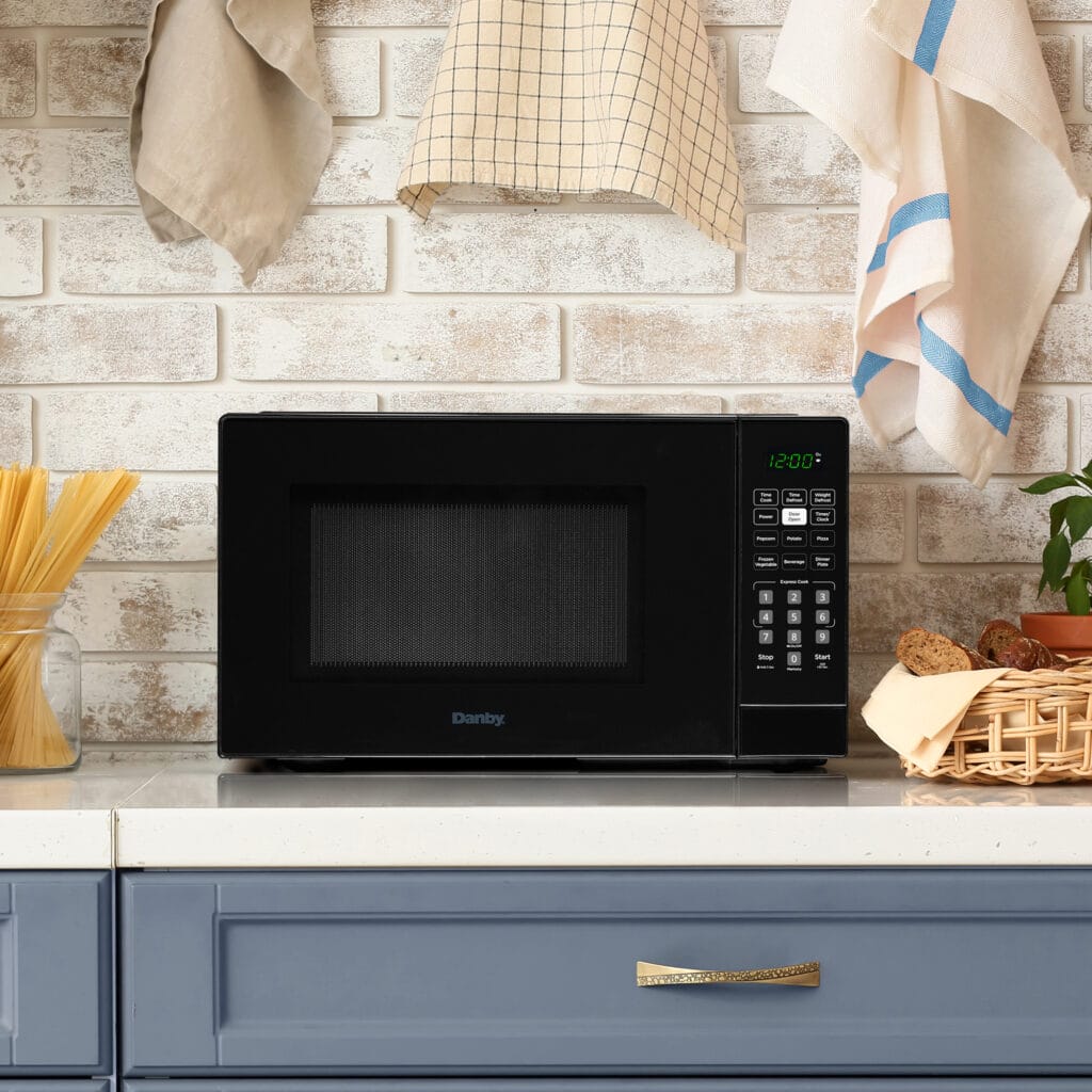 Danby DBMW0921BBB 0.9 cu. ft. Compact Countertop Microwave Oven - Black - Perfect for Small Kitchens, Dorms, and Office Spaces
