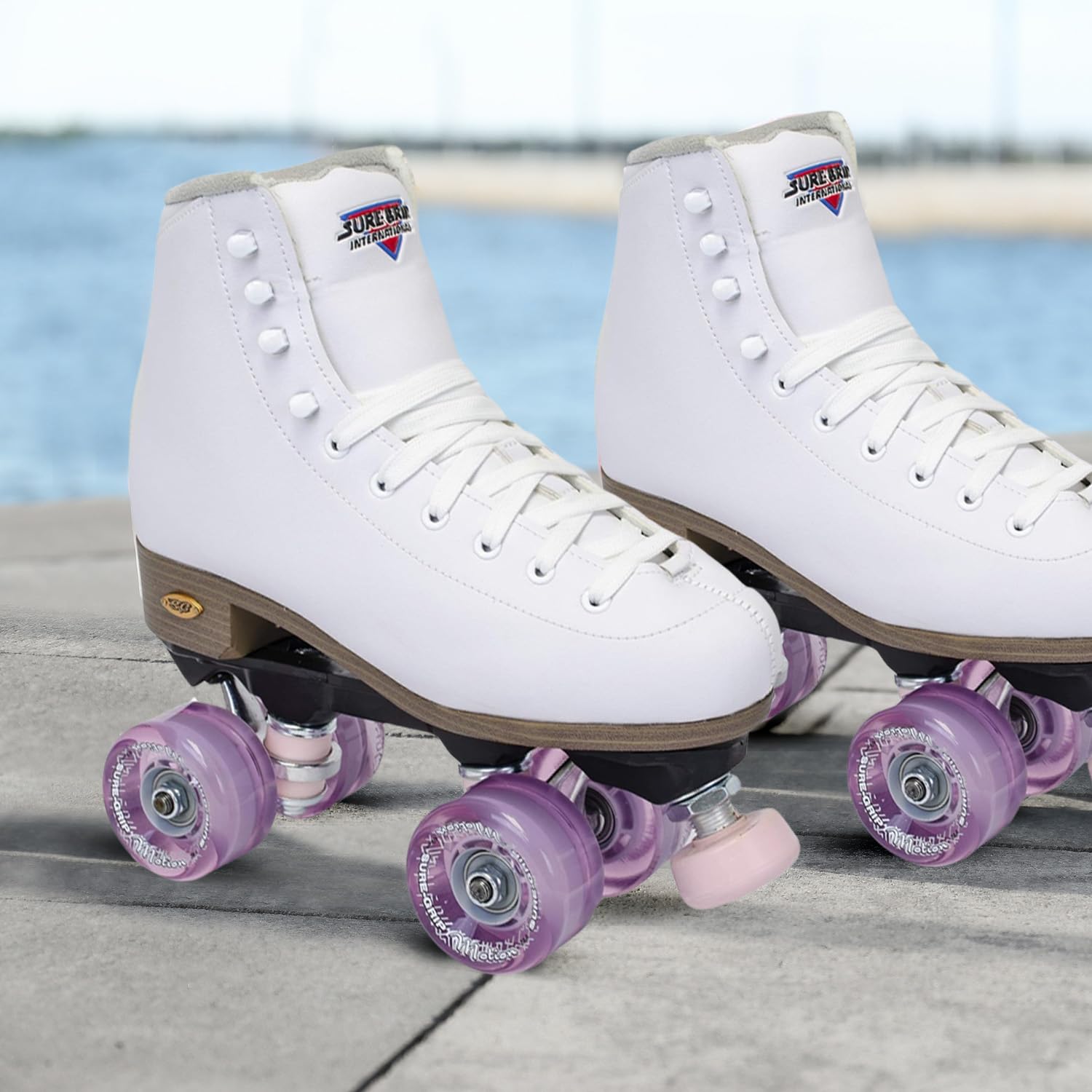 Sure-Grip Fame White Vegan Roller Skates with Pink Motion Wheels - Microfiber Lined Boot, Rock Nylon Plates & Aluminum Trucks - Pink Cushions & Toe Stop - Perfect for Outdoor Skating & Park Adventures