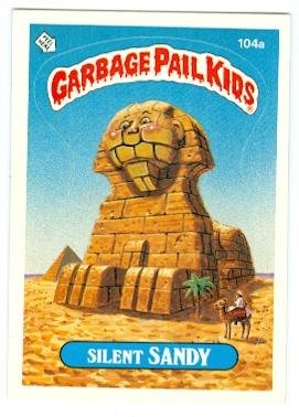 Vintage 1986 Topps Garbage Pail Kids Sticker Trading Card #104A Silent Sandy - Rare Collectible for Trading Card Enthusiasts & 80s Nostalgia Fans - Perfect for Collections, Displays, and Trading Card Games