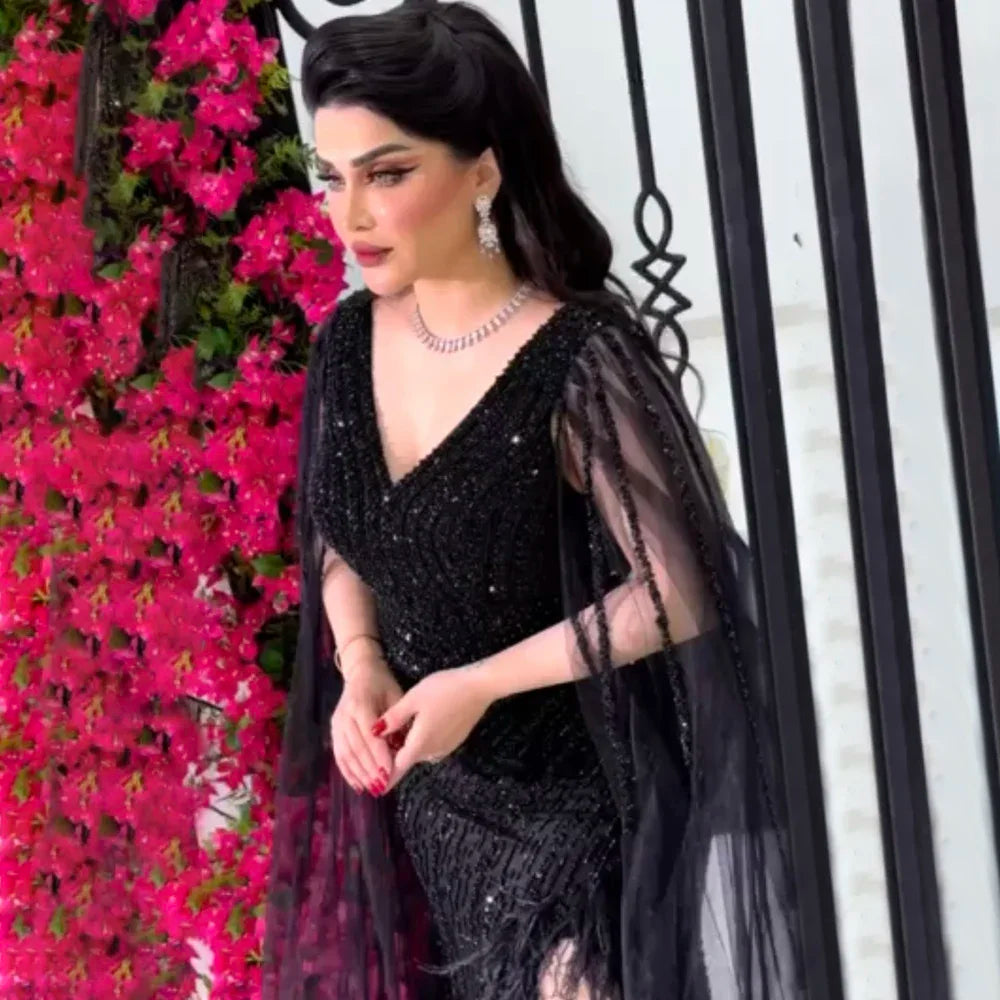 Serene Hill Black Mermaid Evening Gown with Cape Sleeves, High Slit & Beaded Feather Details - Elegant Women's Formal Dress for Prom, Gala & Special Occasions