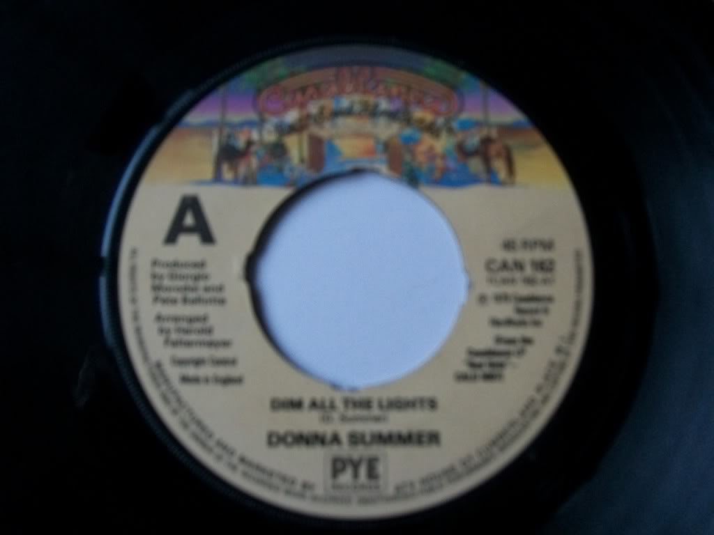 Dim All The Lights - 7 Inch 45 RPM Vinyl Single - Perfect for Retro Music Lovers & DJ Collections