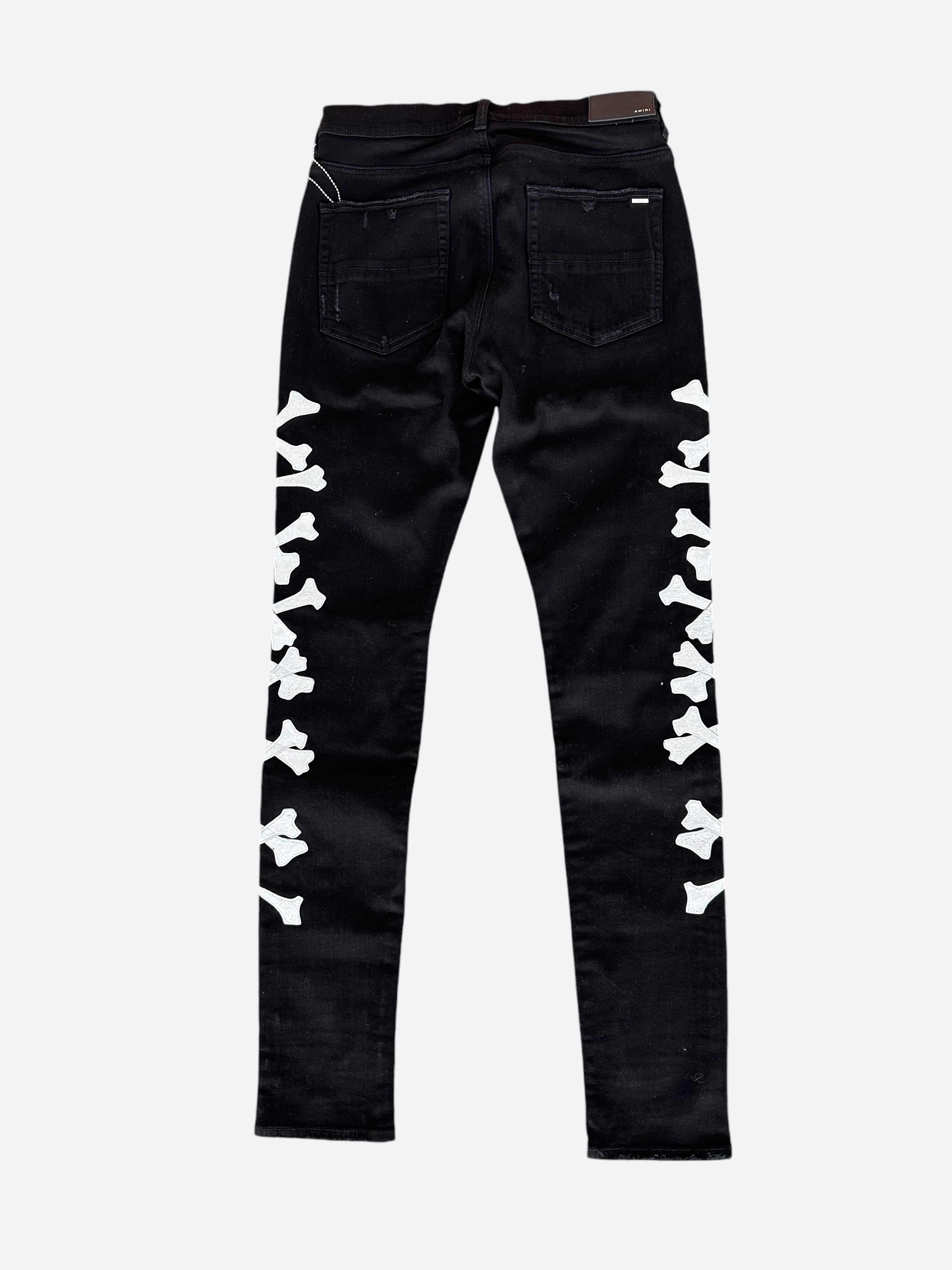 Amiri Black & Silver Bones Applique Distressed Jeans for Men - High Quality Designer Denim Pants | Perfect for Streetwear & Night Out Fashion