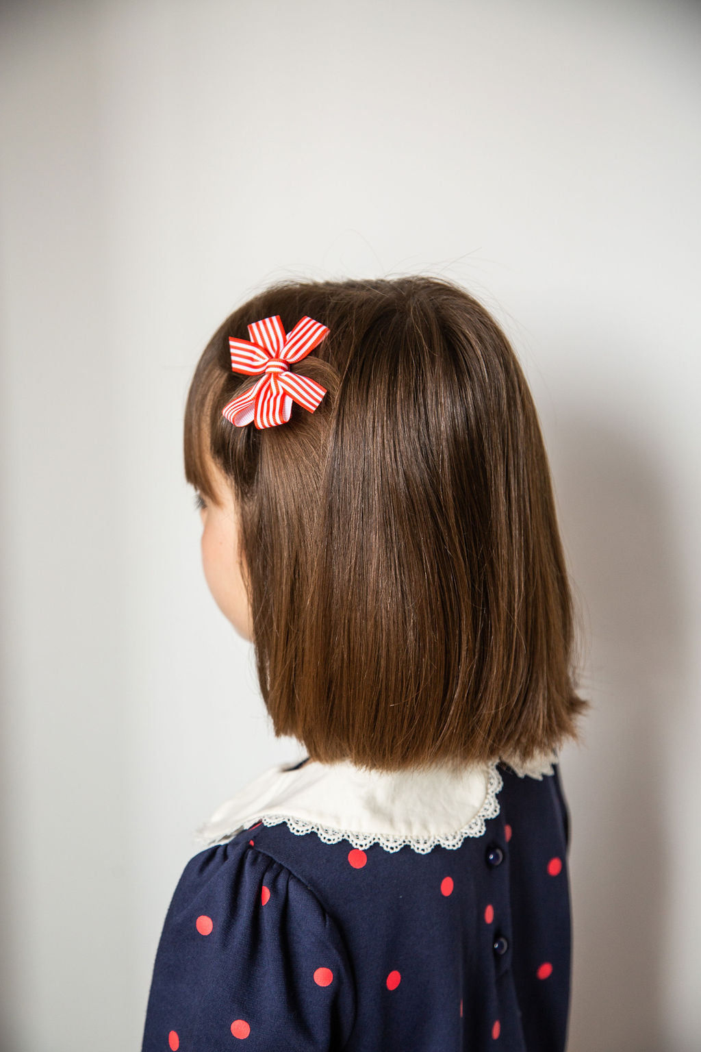 Elegant Striped Pinwheel Bow in Burgundy - Perfect for Hair Accessories, Party Decorations, and Gift Wrapping