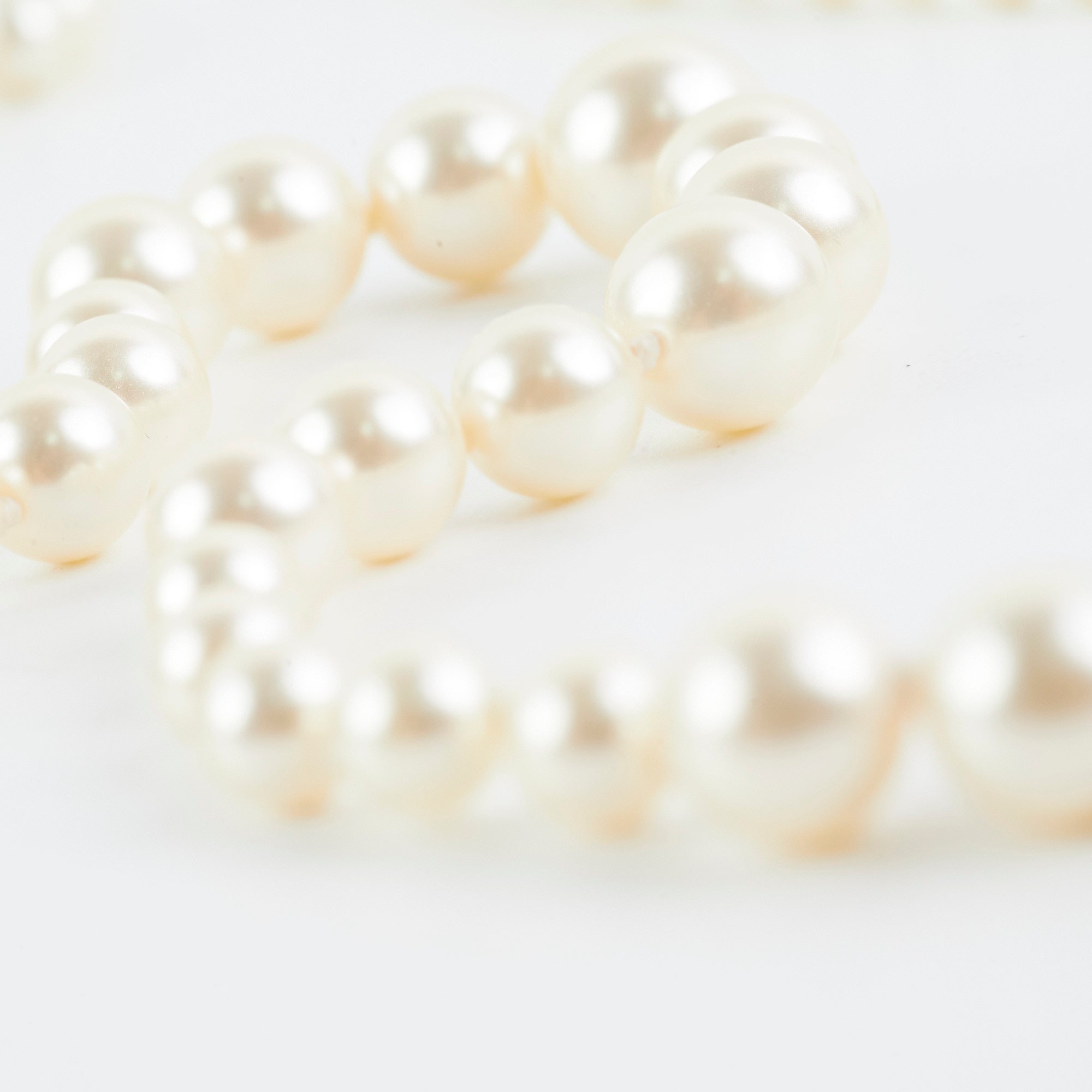 Chanel Long Pearl CC Logo Necklace - Elegant Costume Jewelry for Women | Perfect for Parties, Weddings & Special Occasions