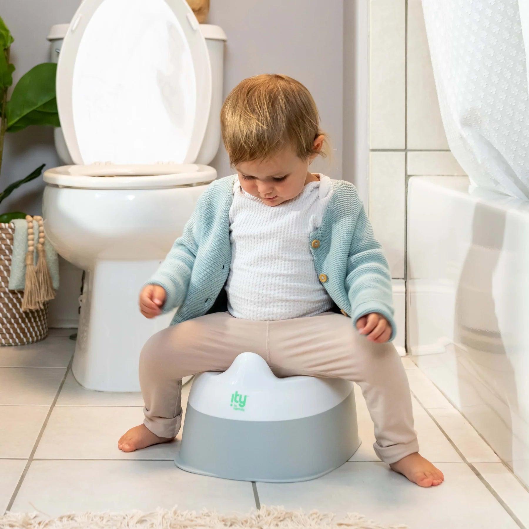 Ingenuity Ready Set Go Potty Training Seat for Babies & Toddlers - Easy-to-Clean, Comfortable & Portable Potty Chair for Boys & Girls - Perfect for Home, Travel & Daycare Use
