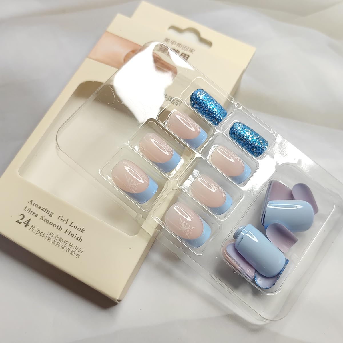 24Pcs Christmas Press on Nails - Medium Square Fake Nails with Snowflake & Blue Glitter French Tip Design, Full Cover Acrylic Glue on Artificial Nails for Women | Perfect for Holiday Parties, Gift Giving & Winter Manicures
