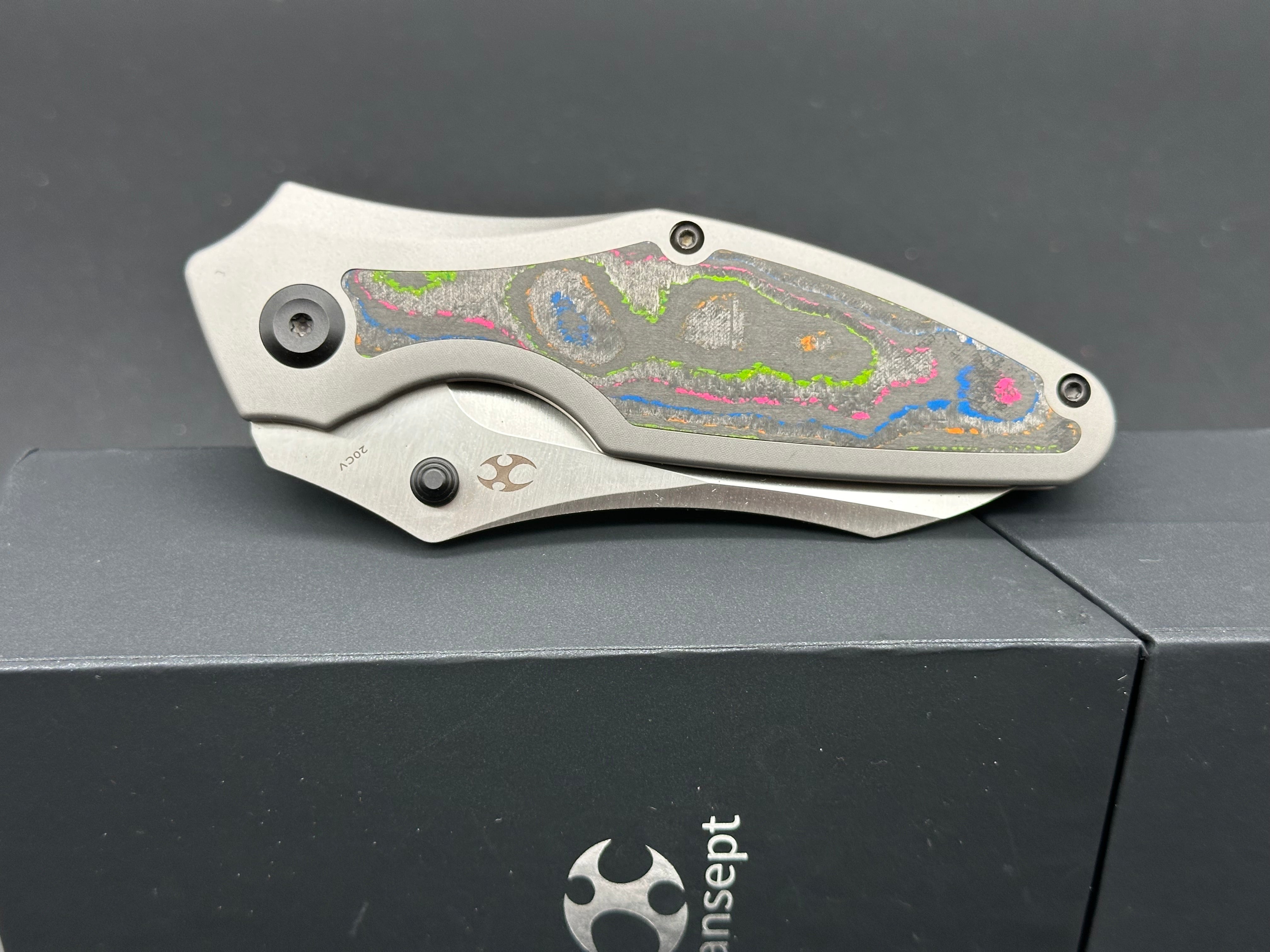 KANSEPT BABA YAGA Folding Pocket Knife - Titanium Handle with 80s Camo Carbon Fiber Inlay, 20CV Steel Plain Edge Blade - EDC, Camping, Outdoor Survival Gear