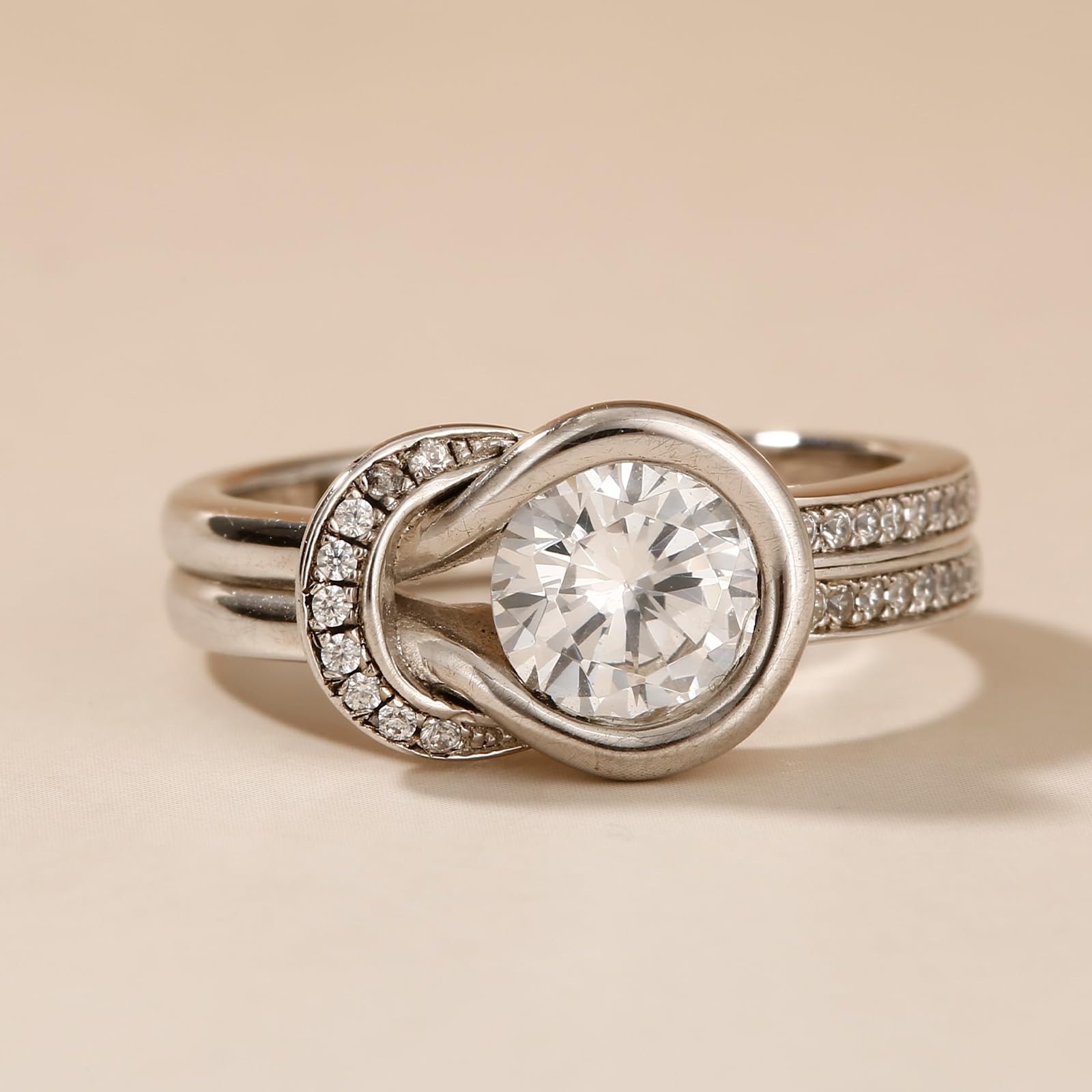 Jeulia Sterling Silver Infinity Knot Engagement Ring Set with Round Cut Halo Crystal - Classic Bridal Wedding Band, Anniversary & Promise Ring, Gift Box Included - Perfect for Proposals, Weddings, Anniversaries & Special Occasions