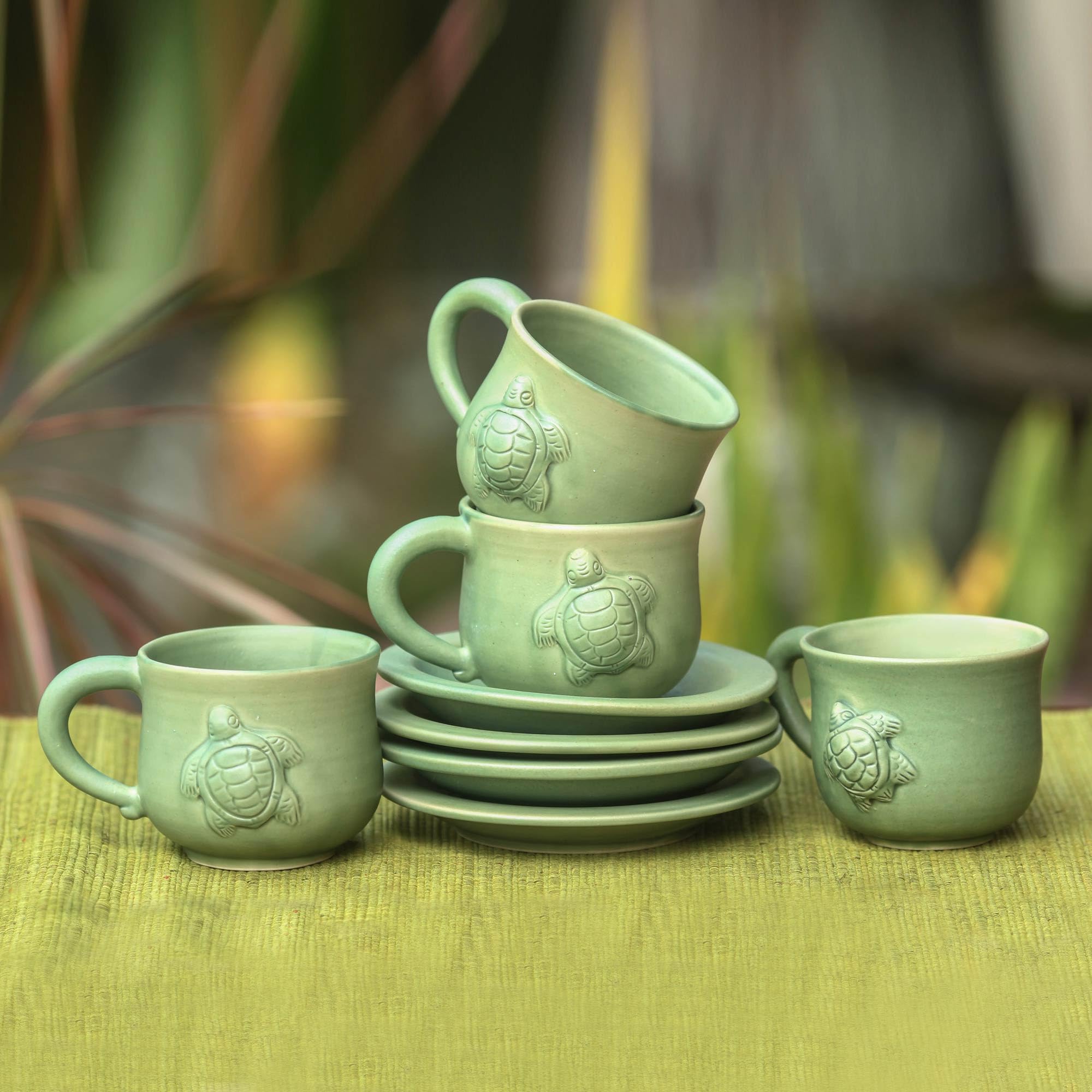 NOVICA Handmade Ceramic Cup and Saucer Set - 4 Piece Green Indonesian Tableware, Dinnerware, Mugs with Hemlock Limpet Shell & Turtle Design - Good Luck Tropical Decor (2.8