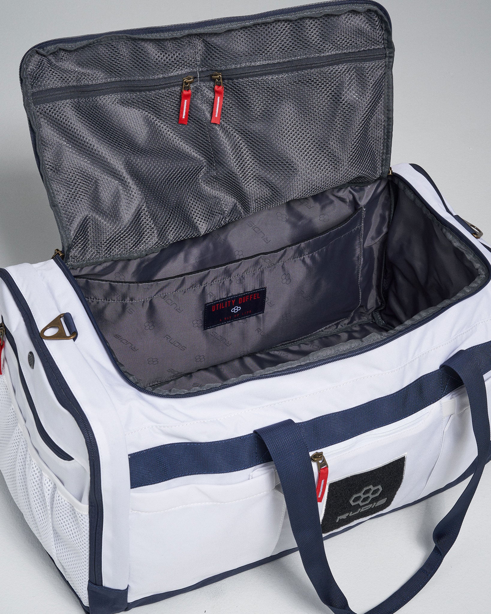 RUDIS Utility Duffel Bag - Large Sports Gym Bag with Multiple Pockets, Durable Travel Duffel for Men & Women - Perfect for Workout, Gym, Travel & Sports Gear Storage (White)