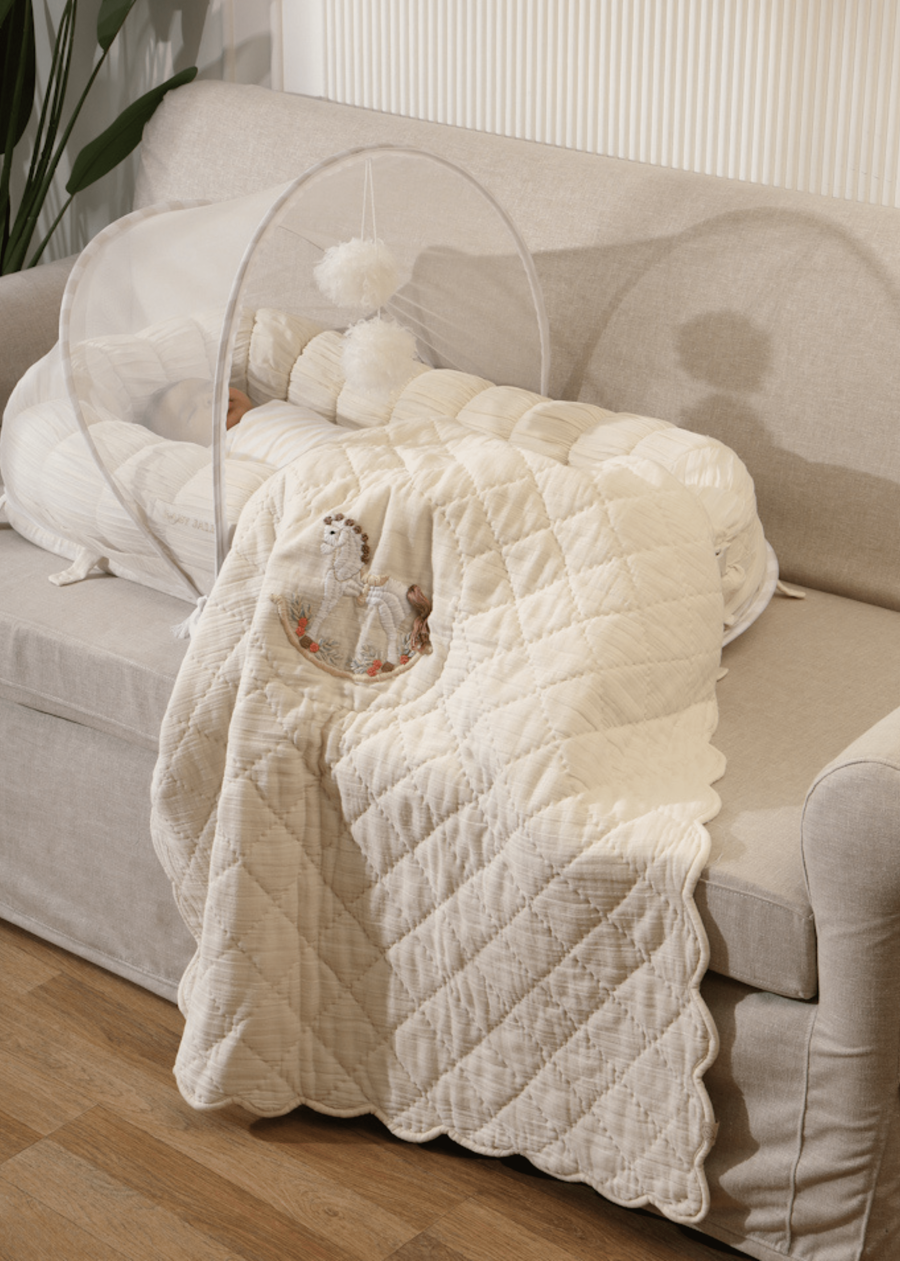 The Sleep Cloud Nest Ecru Baby Blanket with Rocking Horse Design - Soft & Cozy for Nursery, Swaddling, and Stroller Use