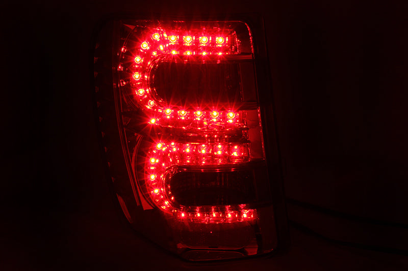 ANZO LED Tail Lights (Red/Smoke) for 1999-2004 Jeep Grand Cherokee - Durable & Bright Replacement Lights for Enhanced Nighttime Safety & Style
