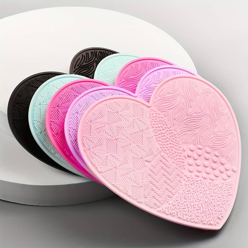 Heart Shaped Portable Makeup Brush Cleaning Pad with Suction Cup | Silicone Brush Cleaner Mat for Quick & Easy Cleaning | Travel-Friendly Beauty Tool | Perfect for Home, Salon & Travel Use (1pc, Random Color)