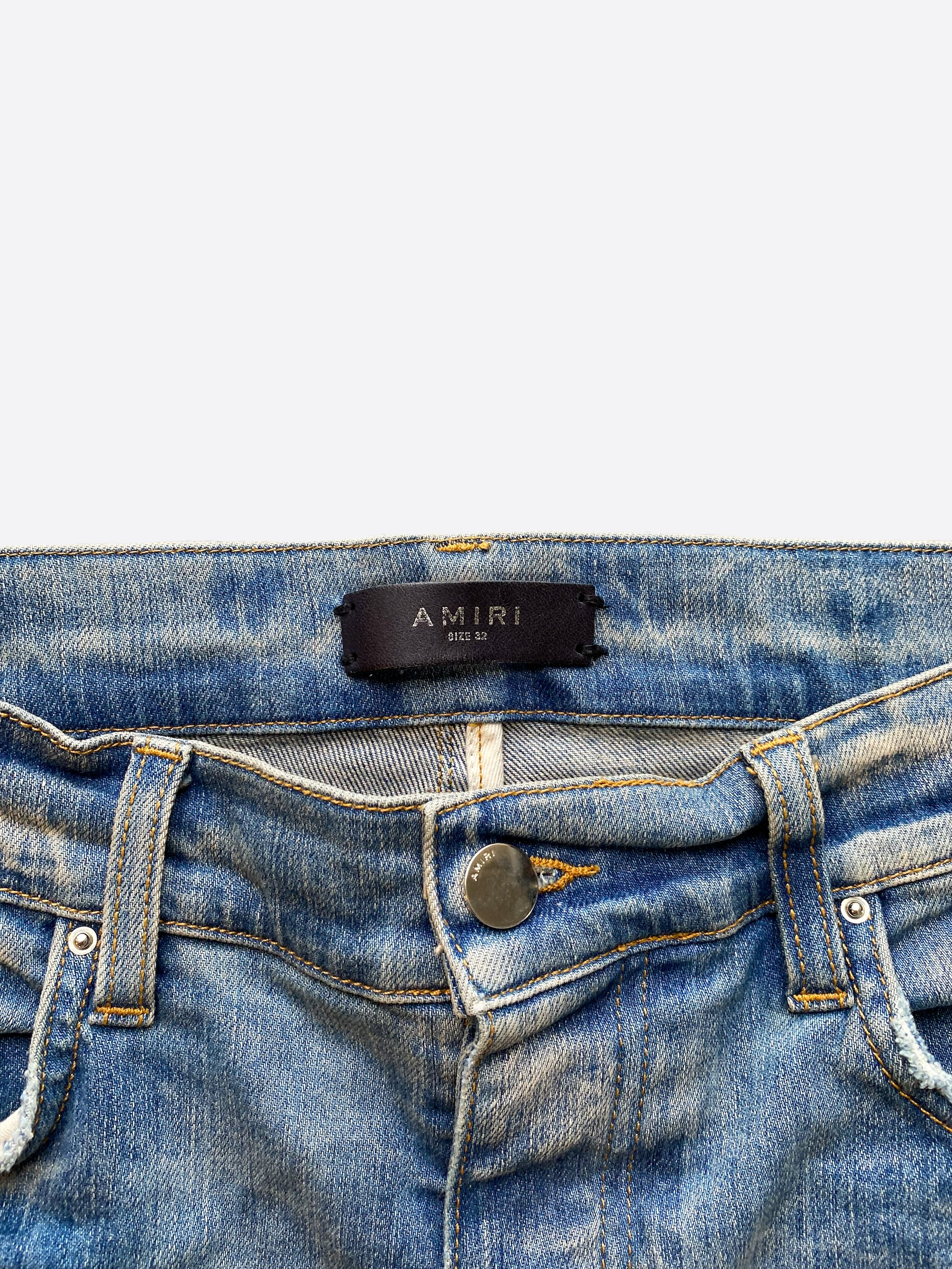 Amiri Logo Applique Blue Distressed Denim Jeans for Men - Stylish Vintage Washed Slim Fit Designer Jeans | Perfect for Casual Wear, Night Out and Street Fashion