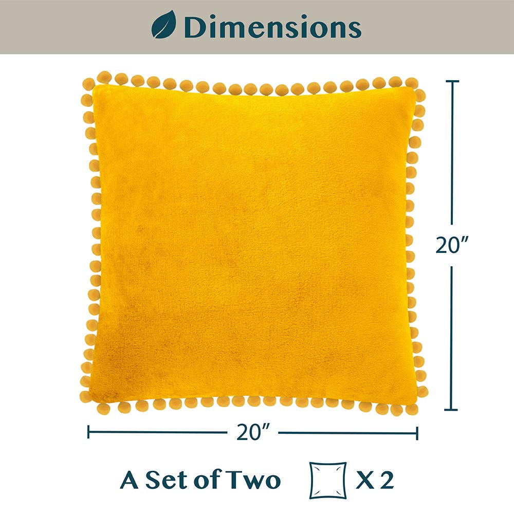 PAVILIA Mustard Yellow Velvet Euro Plush Throw Pillow Covers with Pom Pom - Set of 2 (20x20 Inches) - Decorative Cushion Covers for Bed, Sofa & Couch - Soft Luxury Pillowcases for Bedroom Aesthetic & Living Room Decor