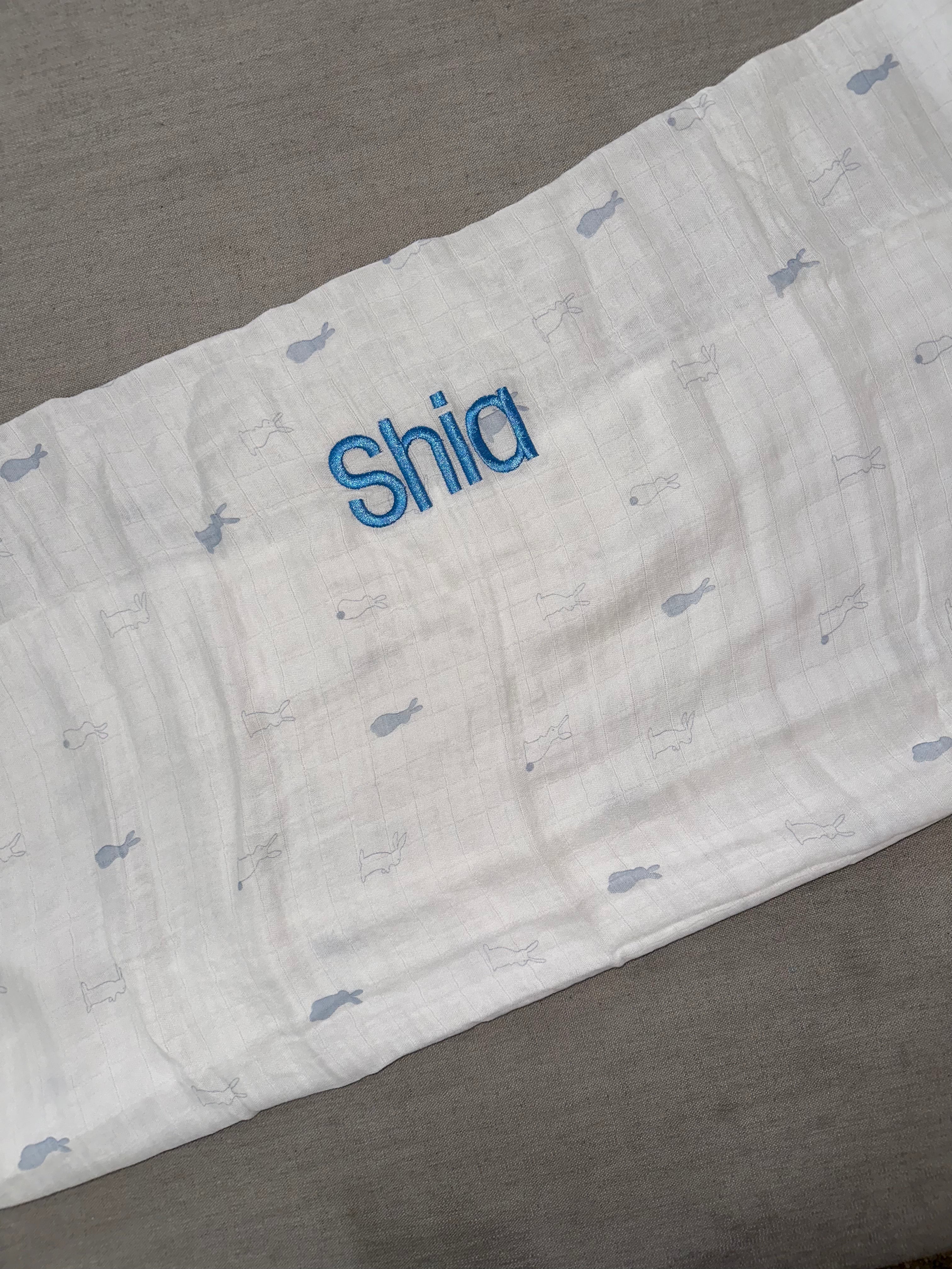 Kipp Collection Blue Bunny Print Swaddle Blanket - Soft & Breathable Baby Wrap for Newborns - Perfect for Swaddling, Nursing, and Photo Shoots