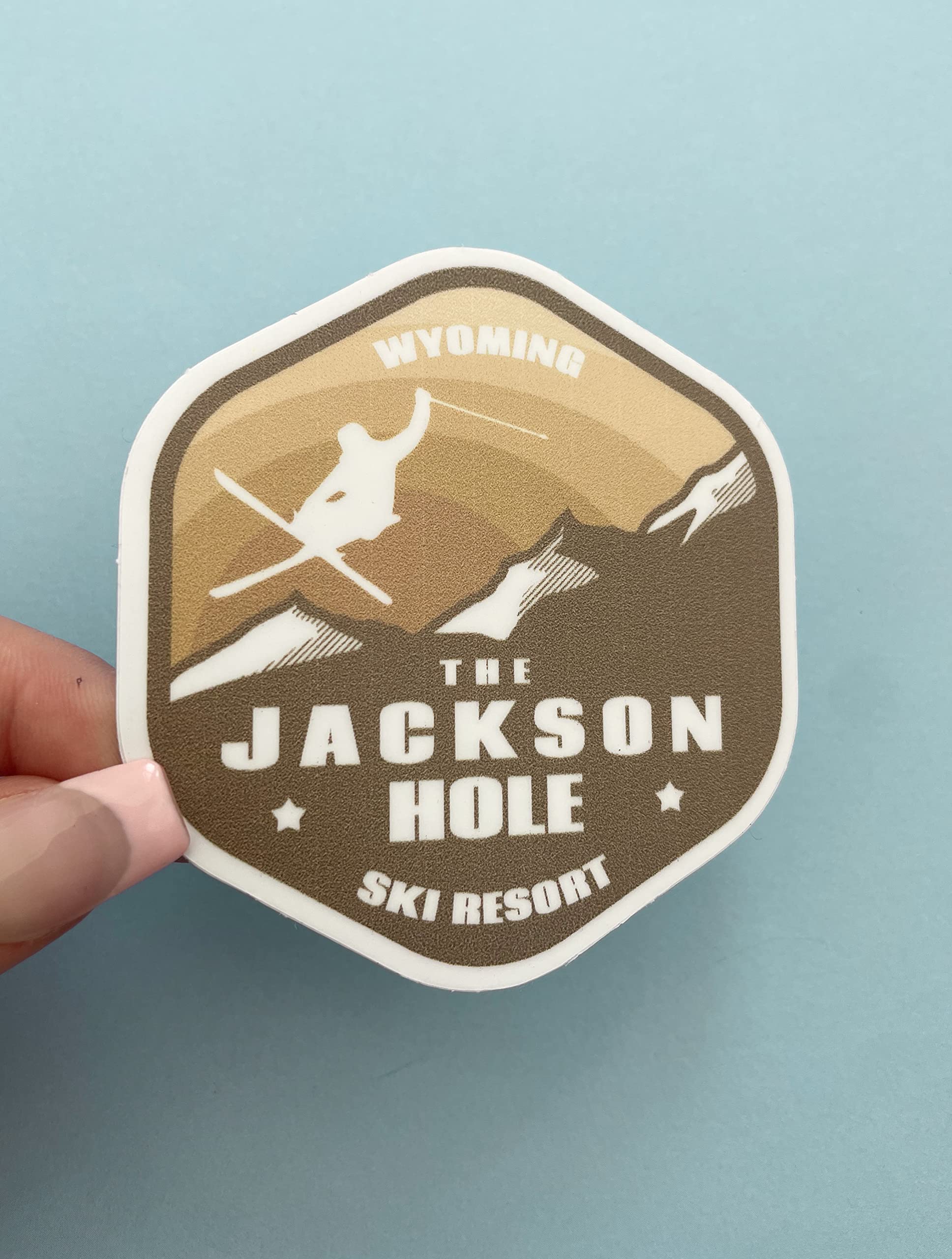 MOJA Jackson Hole Ski Resort Wyoming Snow Ski Sticker - Waterproof Vinyl Decal for Car, Water Bottle, Laptop, iPad, Window, Cooler, Luggage, Bumper, Toolbox, Locker - Brown 3x3 Inches - Perfect for Outdoor Enthusiasts & Ski Lovers