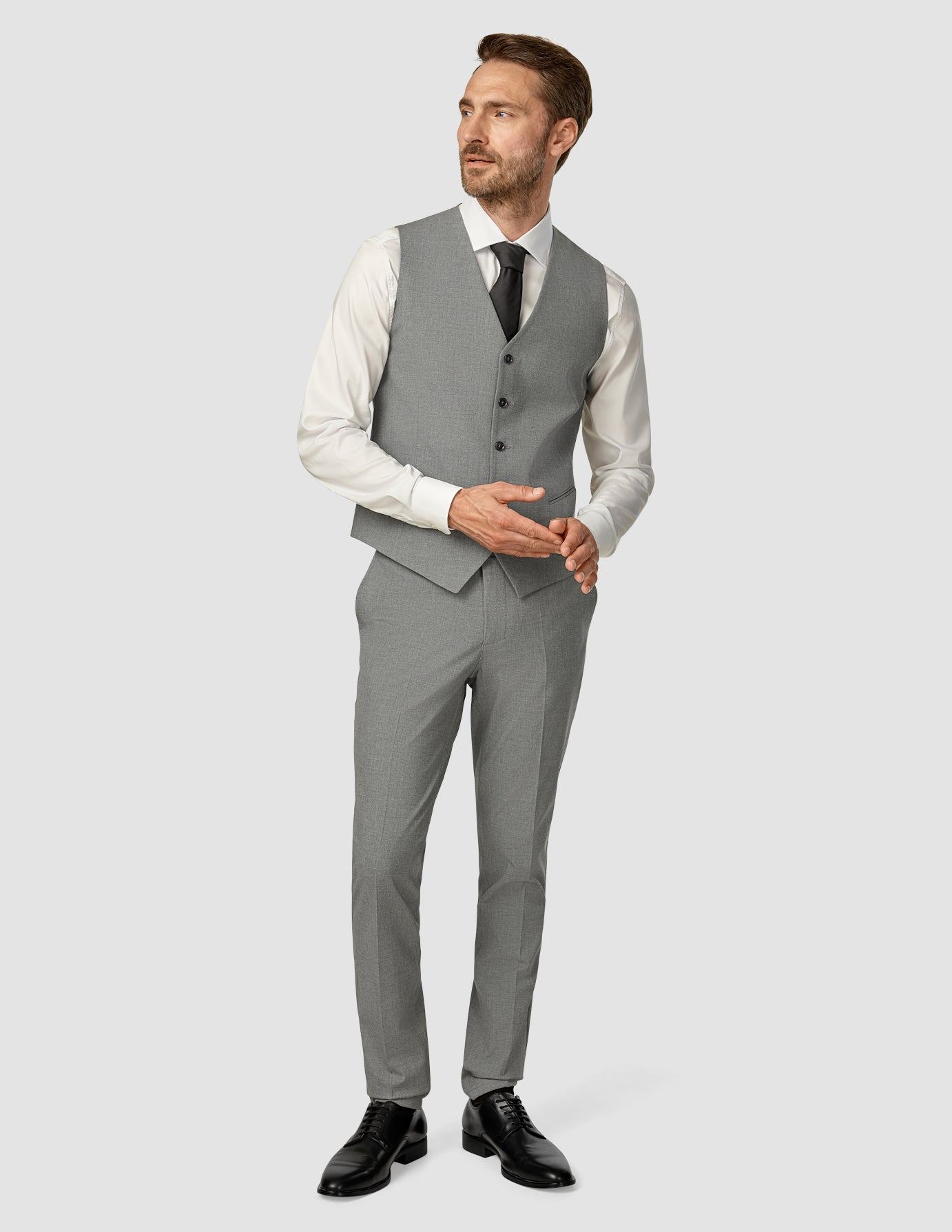 Essential Vest Dark Grey Melange - Lightweight & Stylish Layering for Outdoor Adventures & Casual Wear
