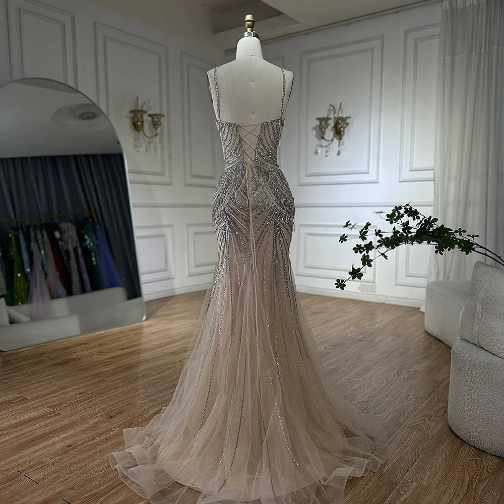 Elegant Silver Nude Spaghetti Strap Mermaid Evening Gown with Beaded Tassels - Dubai Luxury Formal Dress for Prom, Gala & Special Occasions - LA72772