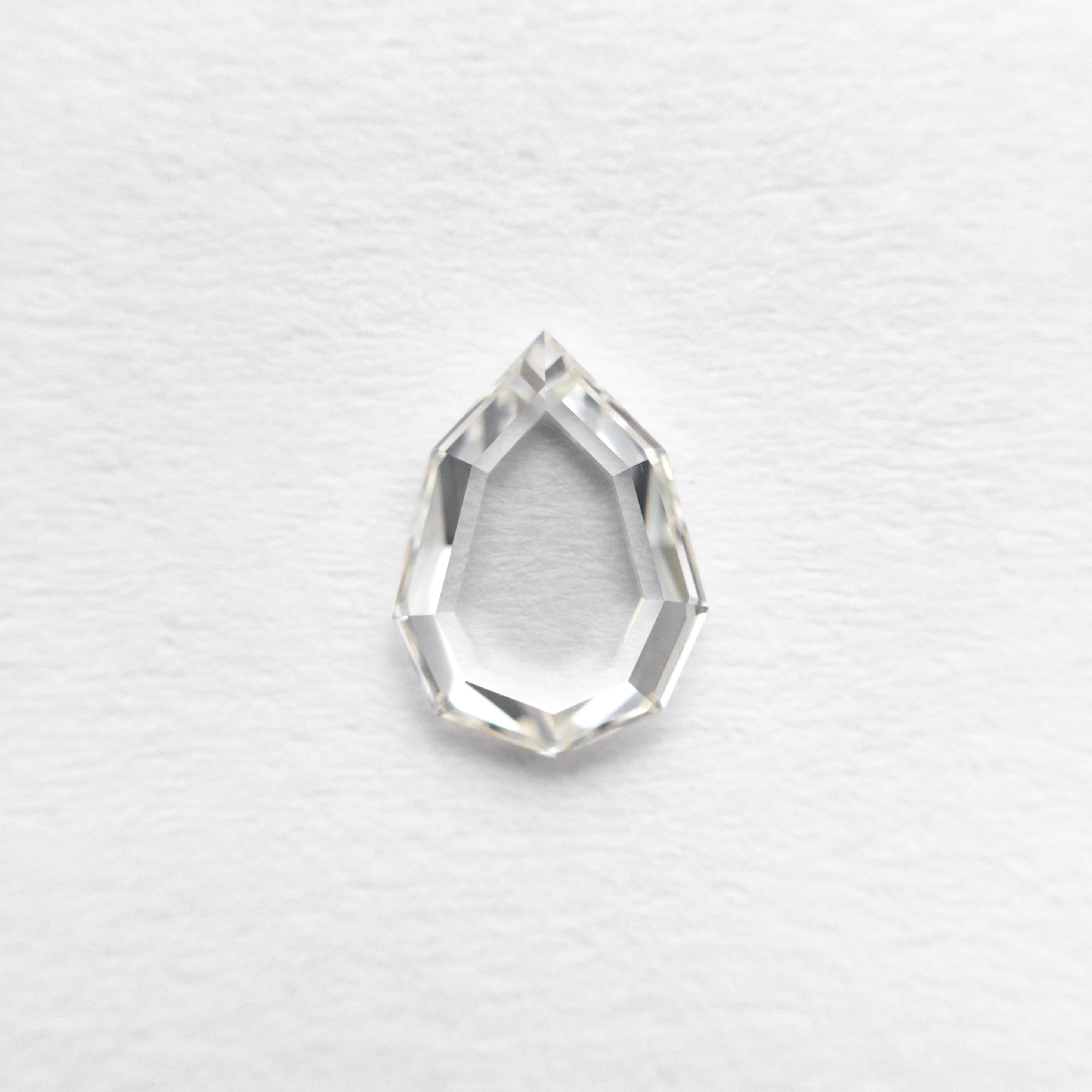 0.57ct Pear-Shaped Diamond (7.13x5.28x1.64mm) VS1 Clarity J Color - Geo Portrait Cut for Engagement Rings & Fine Jewelry