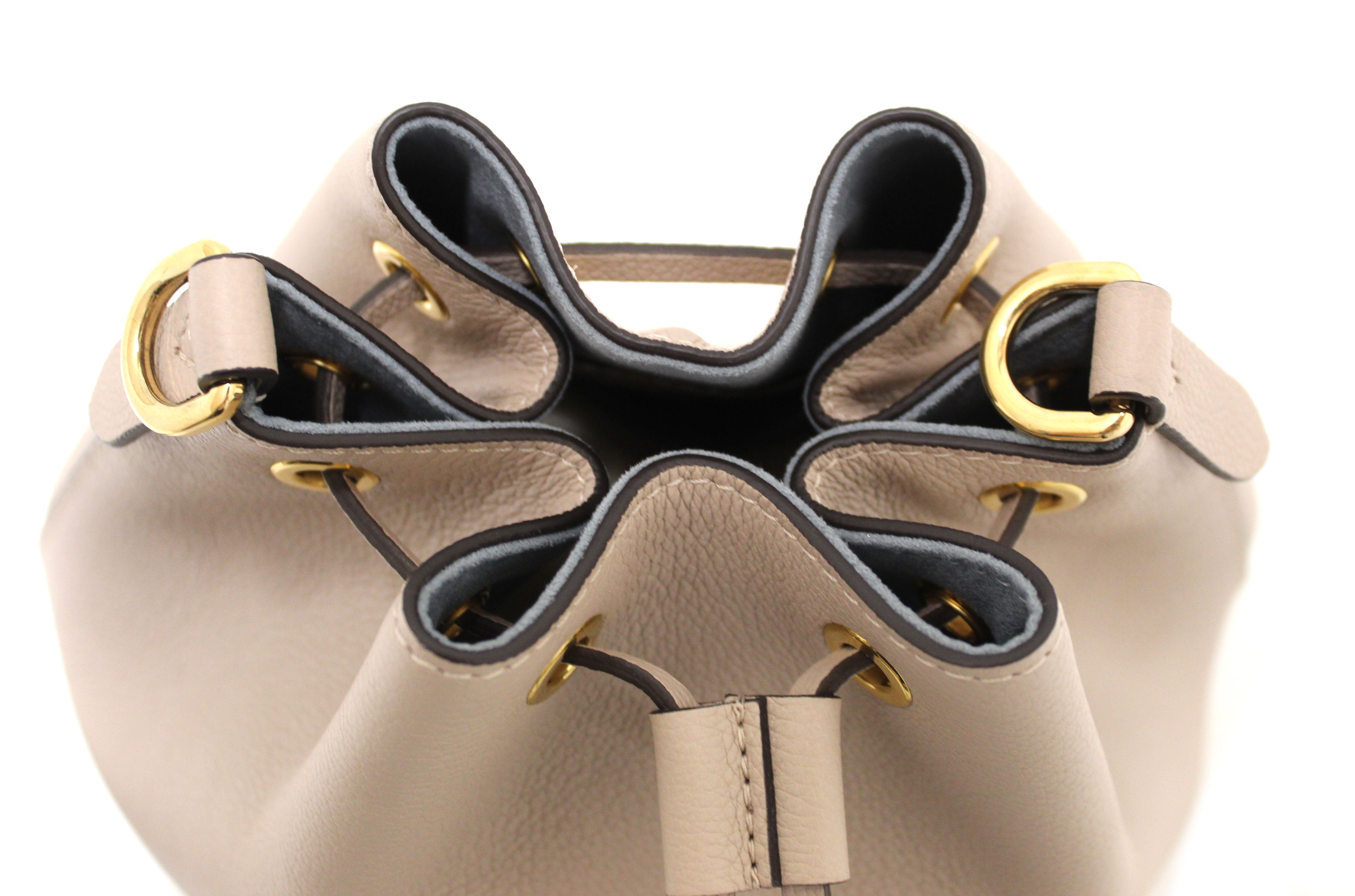Authentic Louis Vuitton Beige Grained Calf Leather Lockme Bucket Bag - Luxury Designer Handbag for Women, Perfect for Work, Travel & Everyday Use