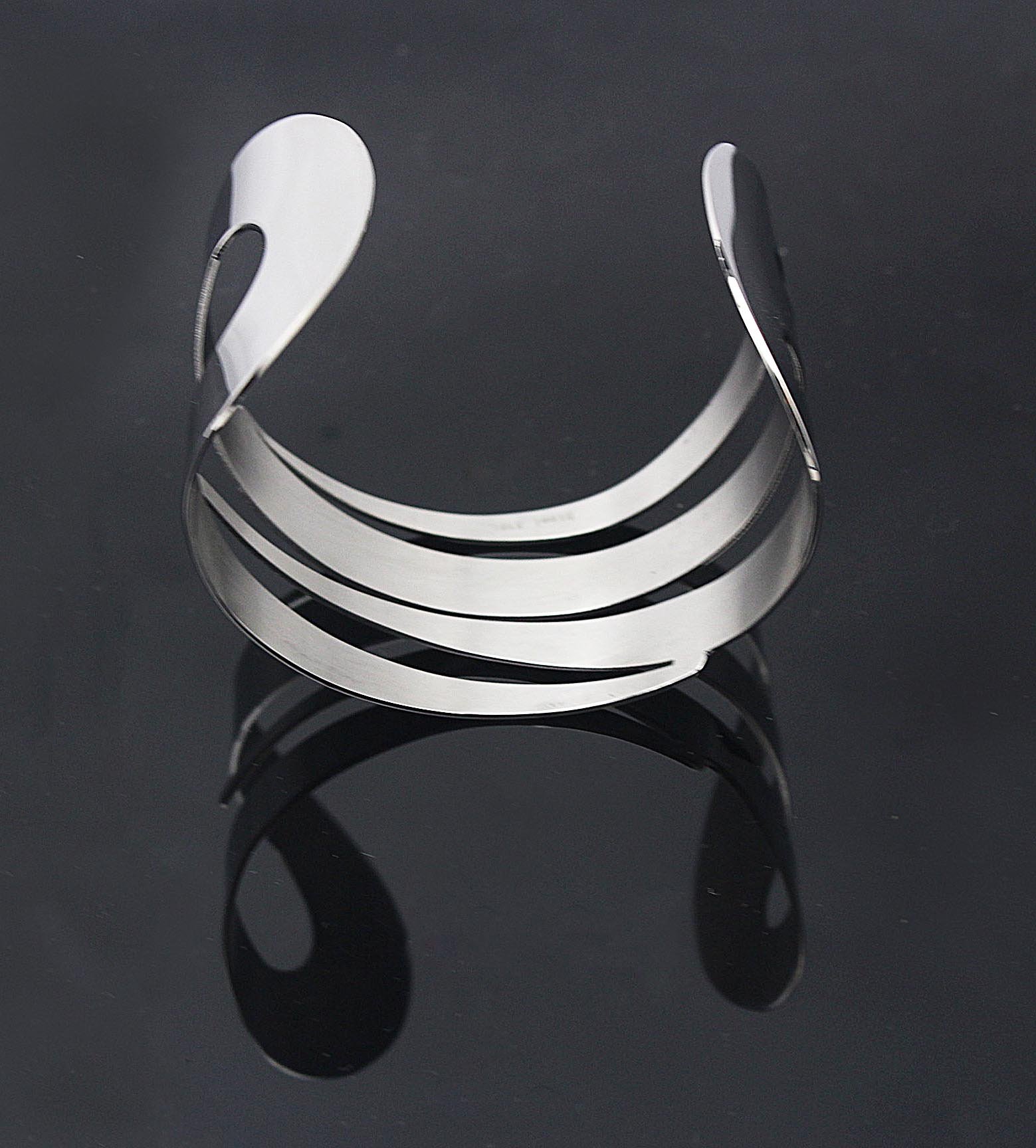 COUYA Women's Fashion Stainless Steel Wide Cutting Cuff Bangle Bracelet - Elegant Silver Jewelry for Parties, Weddings & Everyday Wear