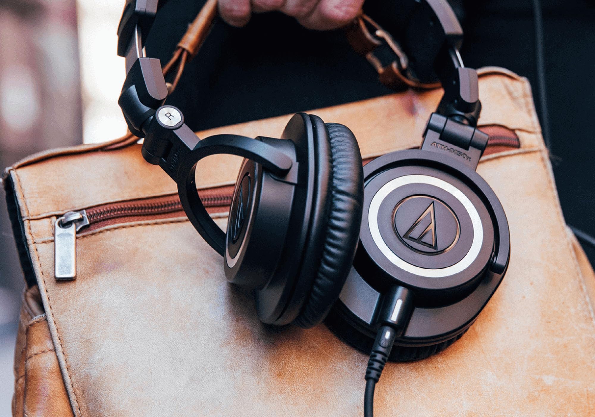 Audio-Technica ATH-M50x Professional Studio Monitor Headphones - Black with Carrying Case, Headphone Stand & Cleaning Cloth | Perfect for Music Production, DJing & Home Recording Studios