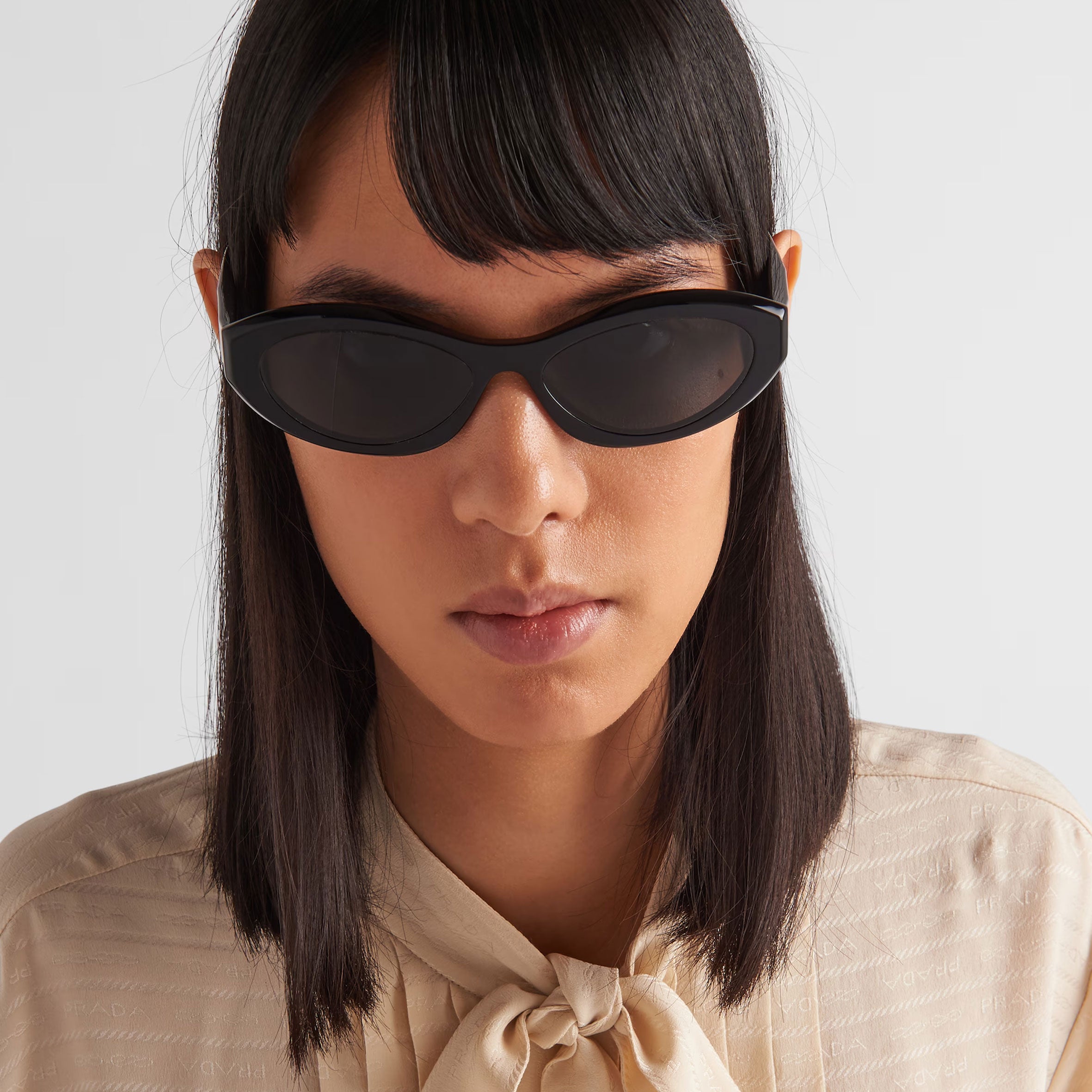 PRADA PR26ZSF Symbole Oval Sunglasses for Women - Black Cat Eye Sunglasses with UV Protection | Perfect for Beach, Driving & Fashion Accessories