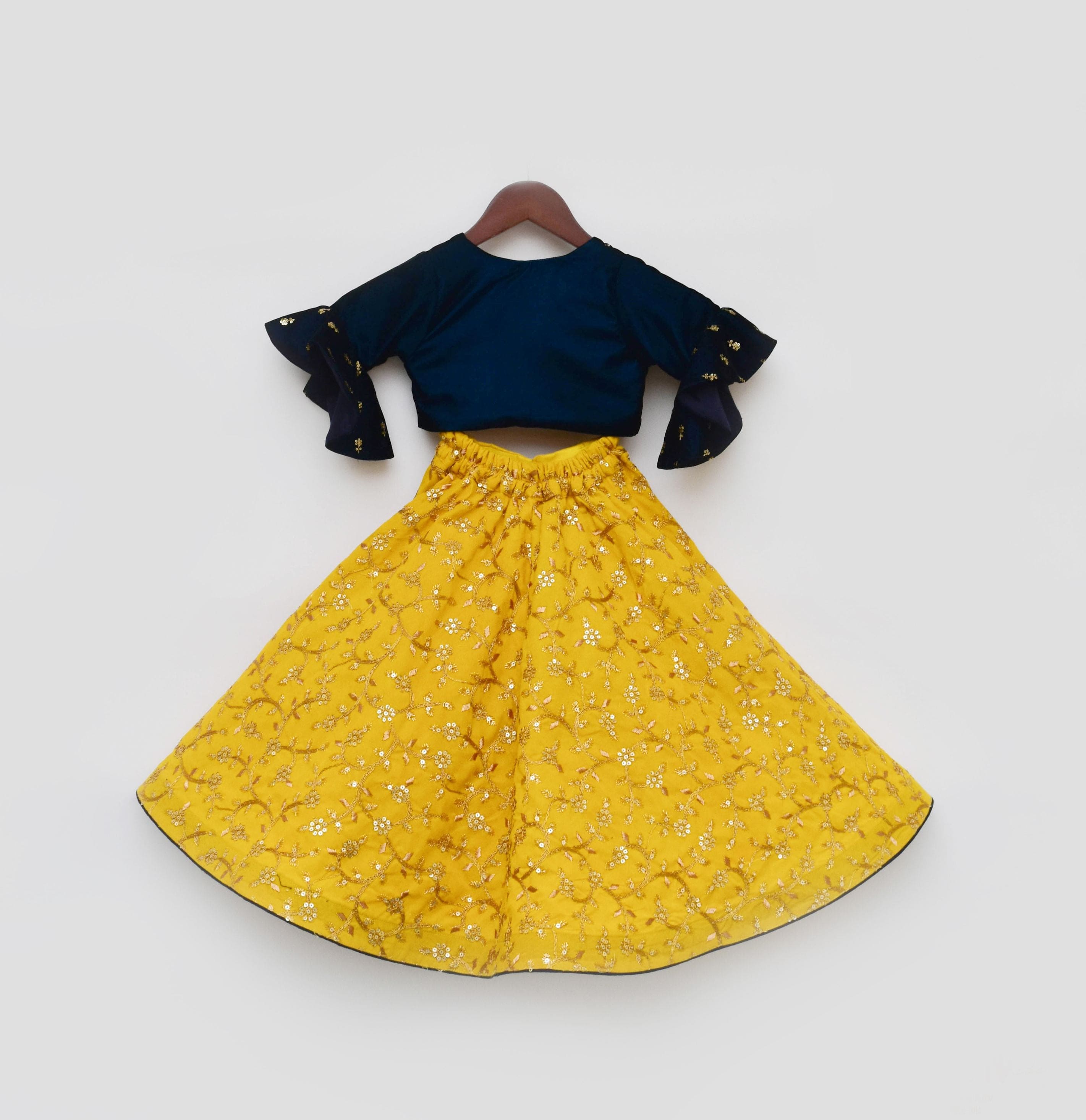 Pre Order: Blue Velvet Crop Top with Yellow Embroidery Lehenga - Elegant Indian Bridal Wear for Weddings & Festivals