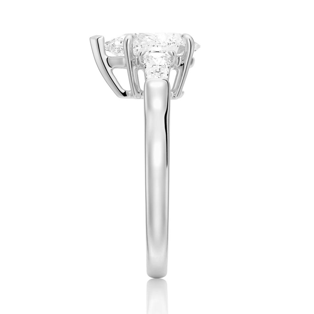 Exquisite Pear Shaped Moissanite Engagement Ring with Tapered Baguette Side Stones | Elegant Wedding Jewelry for Brides & Proposals