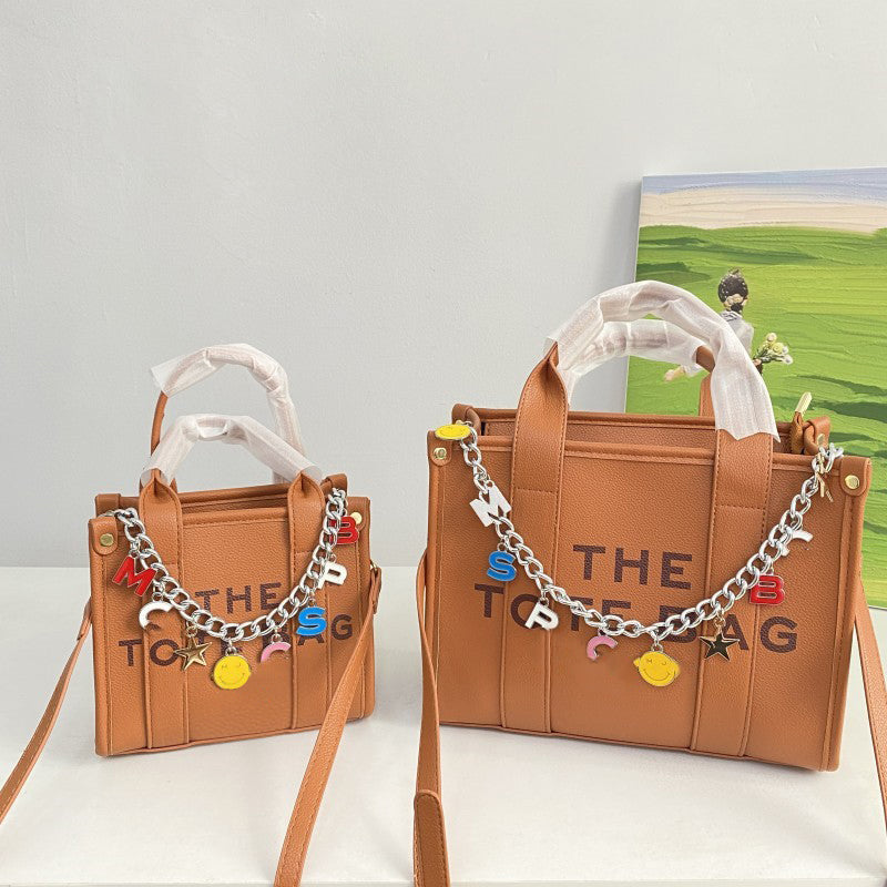 Stylish Letter Chain Tote Bag for Women - Trendy Canvas Shoulder Bag with Metal Chain Strap - Perfect for Shopping, Beach, Work & Daily Use