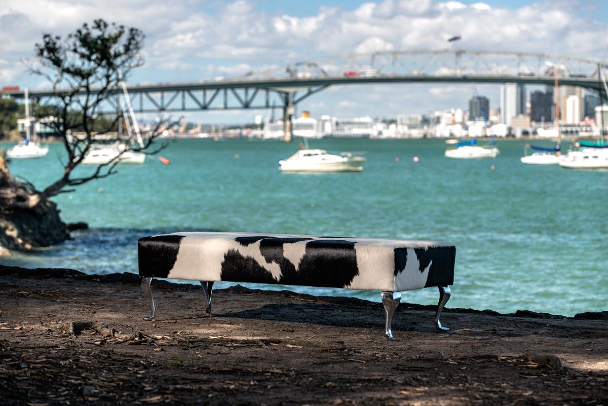 Premium Black and White Cowhide Ottoman with Queen Anne Legs - 63