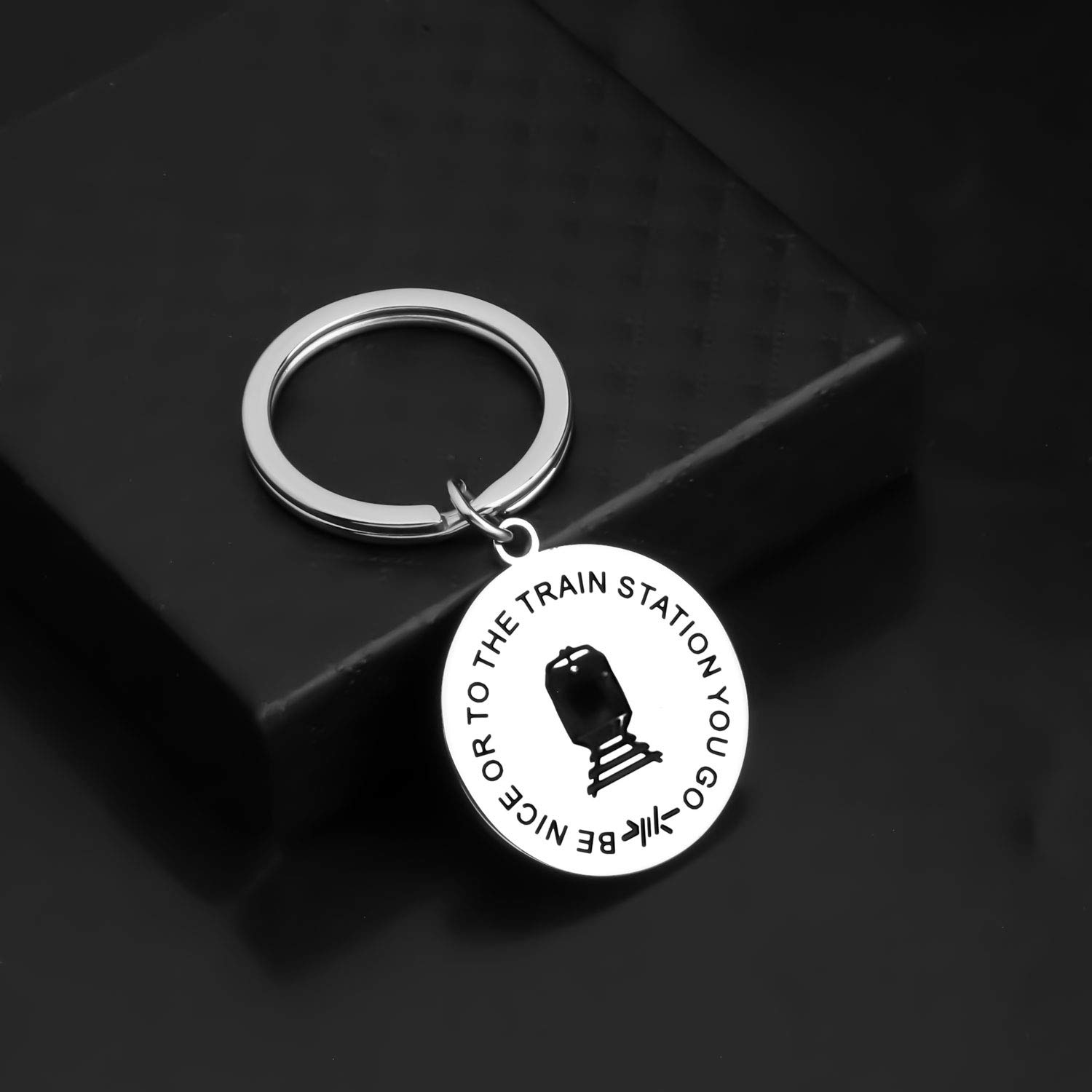 Funny TV Show Inspired Keychain - 'Be Nice Or To The Train Station You Go' Quote - Perfect Gift for TV Show Fans & Pop Culture Enthusiasts - Great for Keyrings, Backpacks, and Fan Collections