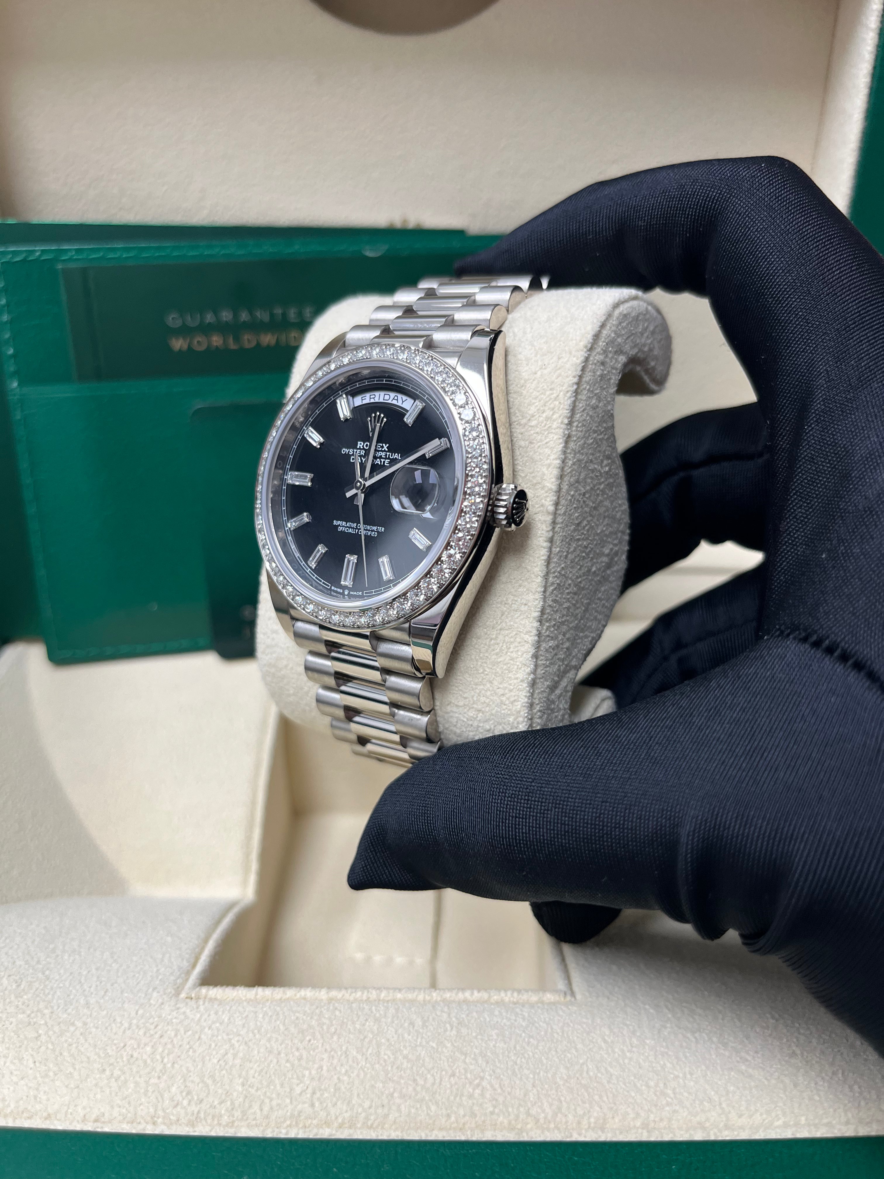 Rolex Day Date 40 White Gold Men's Watch with Black Baguette Diamond Dial & Fluted Bezel - Luxury Dress Watch for Business & Formal Occasions