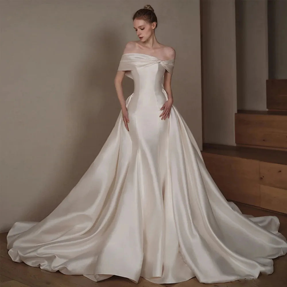 Elegant Off Shoulder Sweetheart Neck Beaded Bow Satin 2-Piece Mermaid Wedding Dress with Detachable Train - Perfect for Beach, Church, and Formal Wedding Ceremonies