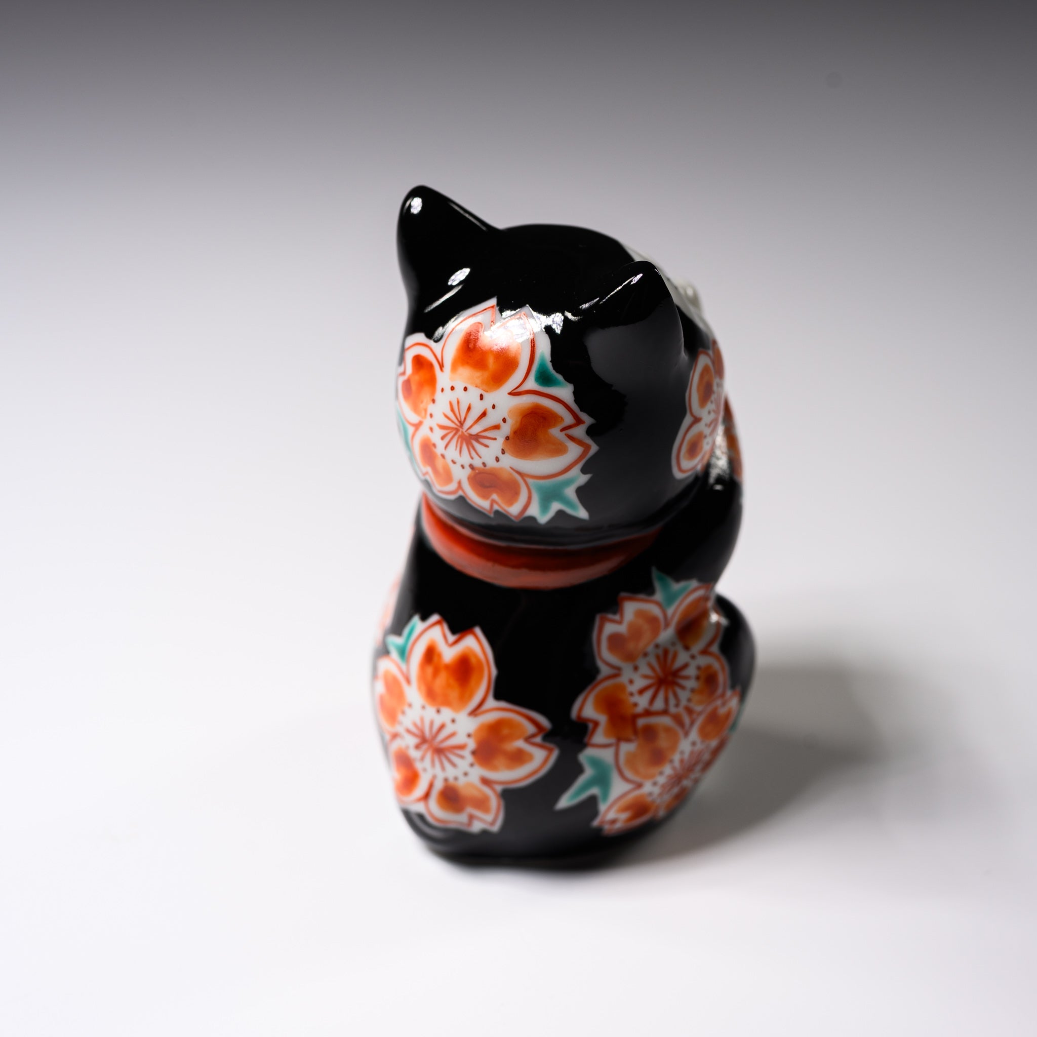 Kutani Ware Black Beckoning Cat Ume - Japanese Lucky Cat Figurine for Home Decor & Office Feng Shui