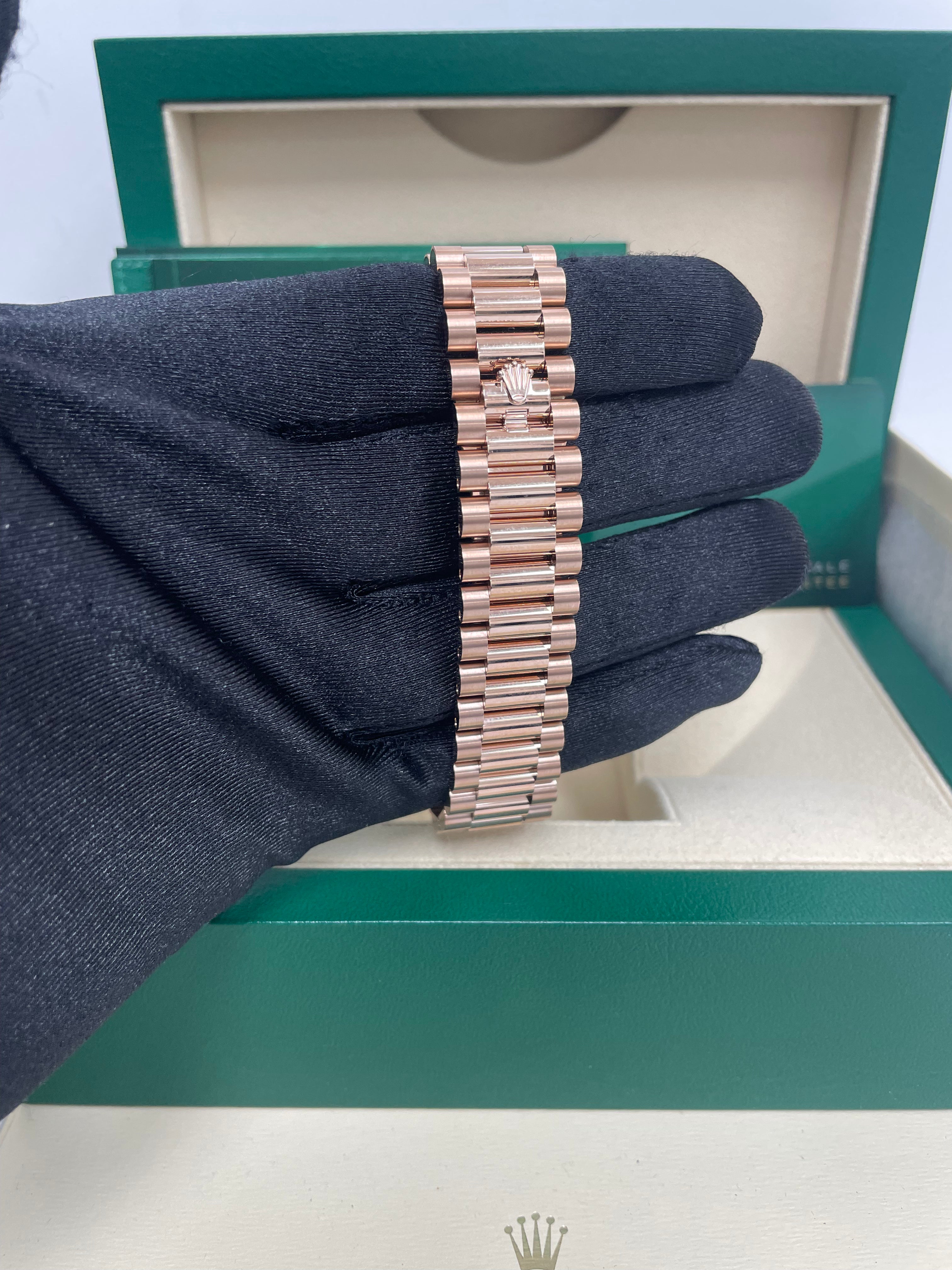 Rolex Everose Gold Day Date 36 Watch with Fluted Bezel & White Roman Dial - President Bracelet Ref# 128235 | Luxury Dress Watch for Business & Formal Occasions
