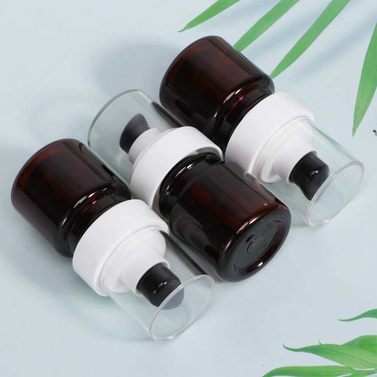 DOITOOL 3Pcs Amber Essential Oil Bottles with Pump - Travel Shampoo, Conditioner & Lotion Dispenser - Refillable Mini Pump Bottles for Makeup, Hand Liquid & Skincare - Perfect for Gym, Travel & Home Use