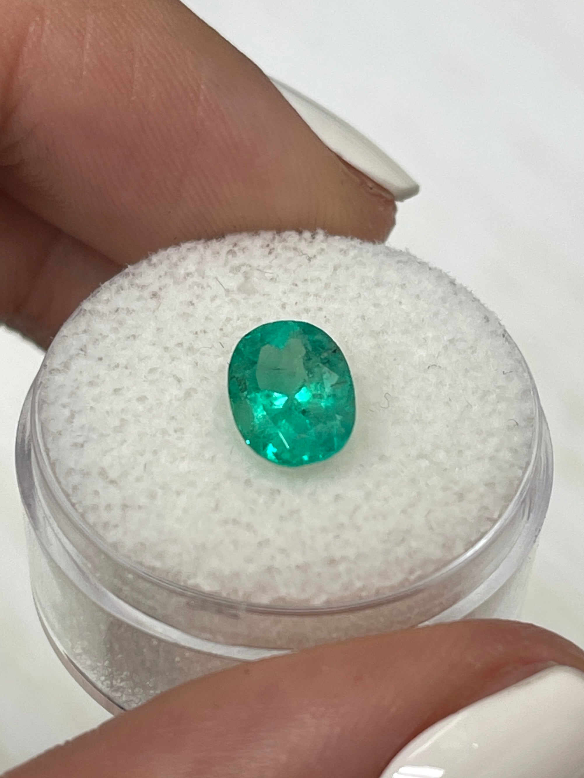 1.74 Carat 9x7mm Natural Colombian Emerald Oval Cut Loose Gemstone - Bluish Green with Freckles for Jewelry Making & Engagement Rings