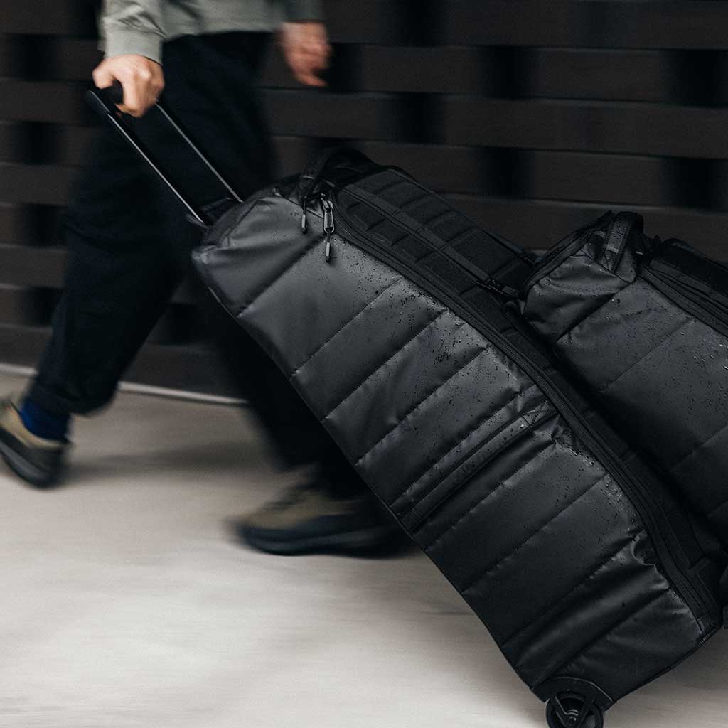 60-Inch Hugger Roller Bag for Checked Luggage - Spacious & Durable Suitcase for Air Travel, Vacations & Business Trips