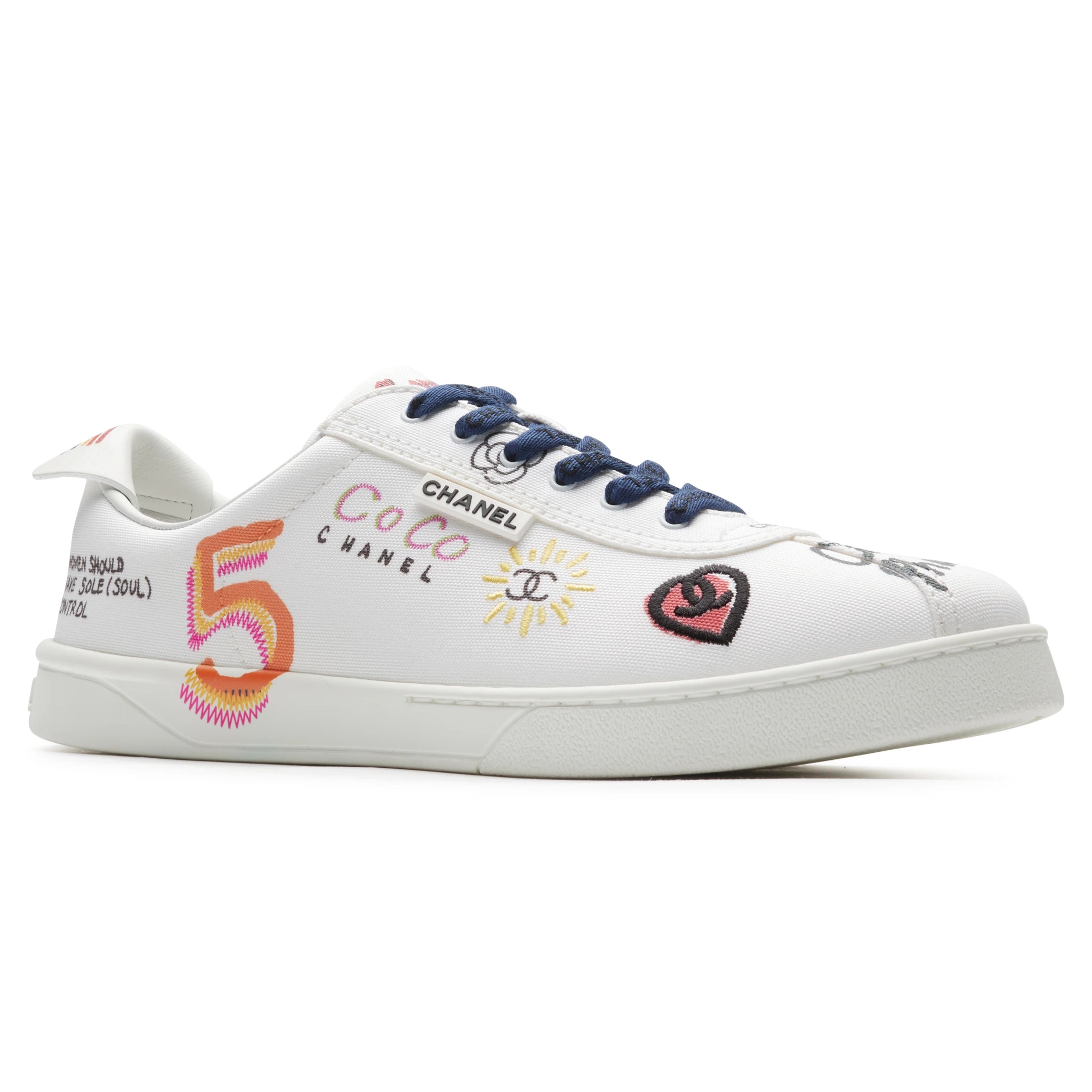 Chanel x Pharrell White Canvas Sneakers - Authentic Pre-Owned Luxury Shoes for Men | Streetwear Fashion, Casual Wear & Collector's Item