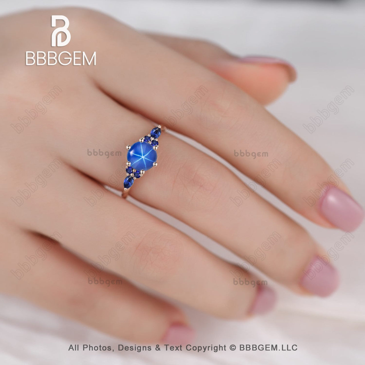 7mm Round Blue Star Sapphire Cluster Lindy Ring with Rose Gold Twisted Rope Band - Elegant Jewelry for Women, Perfect for Weddings, Anniversaries & Special Occasions