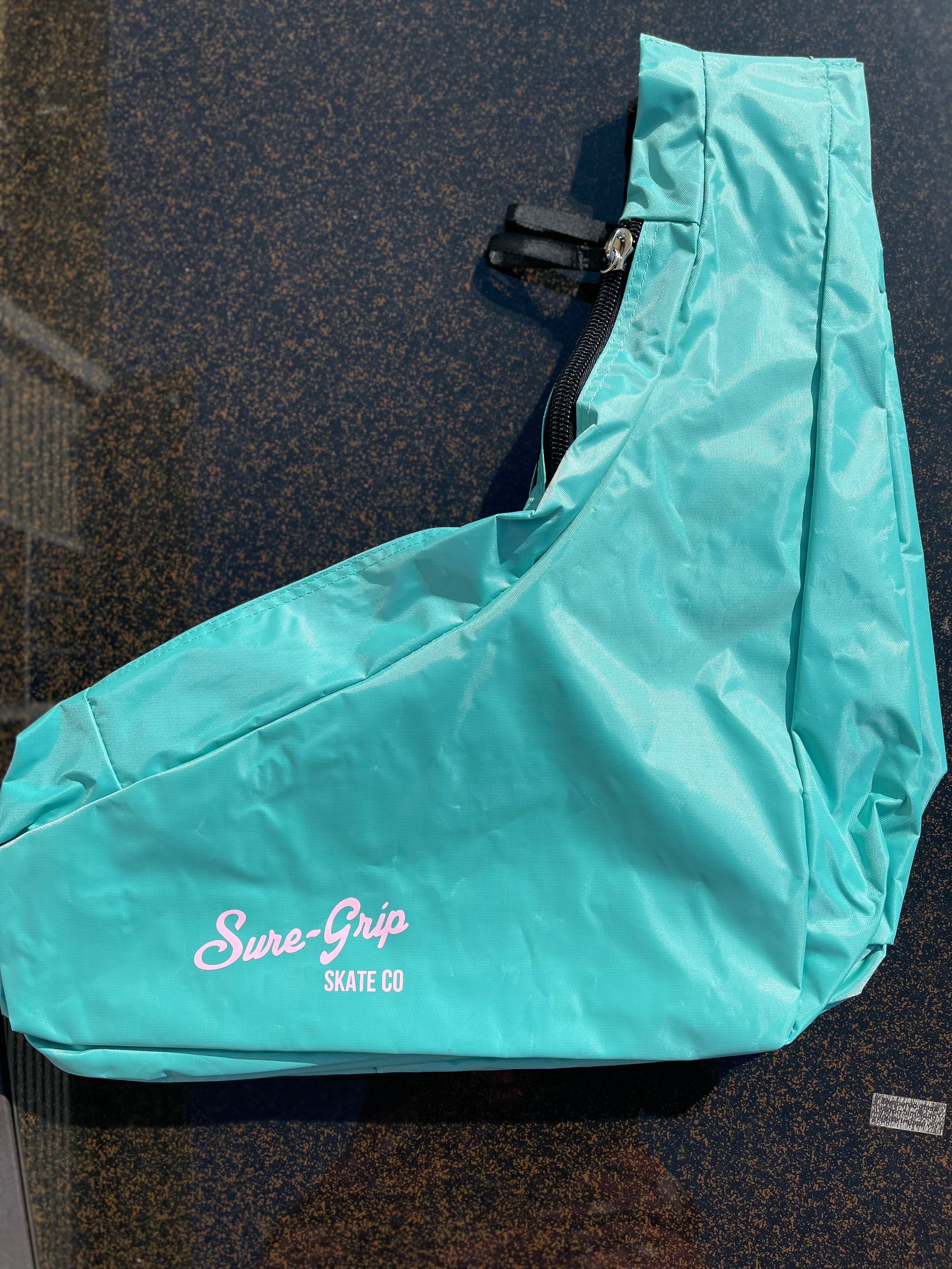 Sure Grip Sling Skate Bag - Durable & Adjustable Skateboard Backpack for Men & Women - Perfect for Skateboarding, Roller Skating & Outdoor Sports